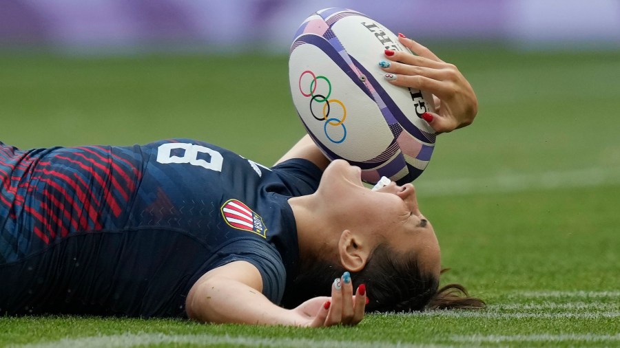 FILE 0- United States' Alex Sedrick reacts after scoring the winning try during the women's bronze medal Rugby Sevens match between the United States and Australia at the 2024 Summer Olympics, in the Stade de France, in Saint-Denis, France, Tuesday, July 30, 2024.. (AP Photo/Vadim Ghirda, File)