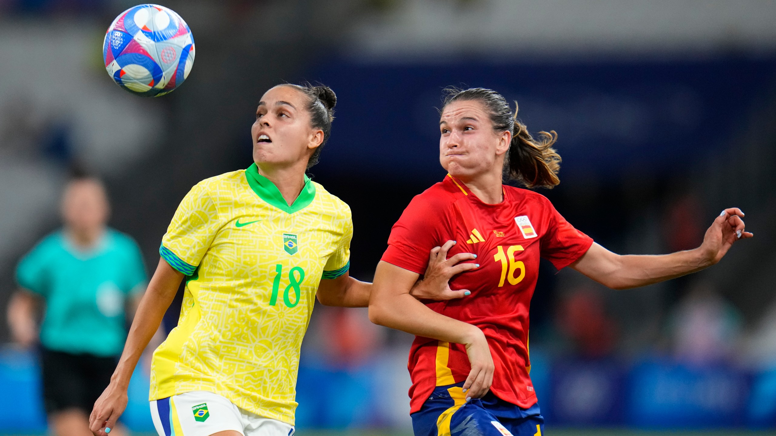 FILE - Brazil's Gabi Portilho, left, and Spain's Laia Codina battle for the ball during a women's semifinal soccer match between Brazil and Spain at the 2024 Summer Olympics, Tuesday, Aug. 6, 2024, at Marseille Stadium in Marseille, France. (AP Photo/Julio Cortez, File)