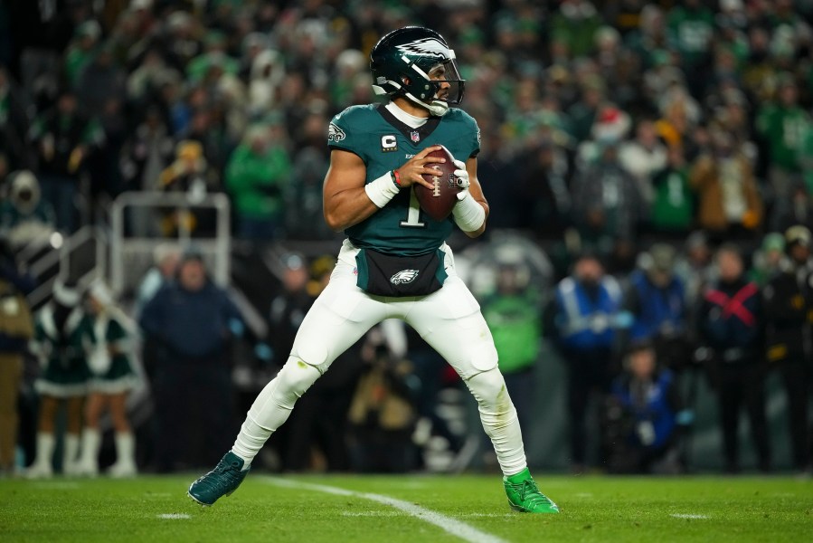 Philadelphia Eagles quarterback Jalen Hurts looks to pass during the first half of an NFL football game against the Pittsburgh Steelers on Sunday, Dec. 15, 2024, in Philadelphia. (AP Photo/Matt Slocum)