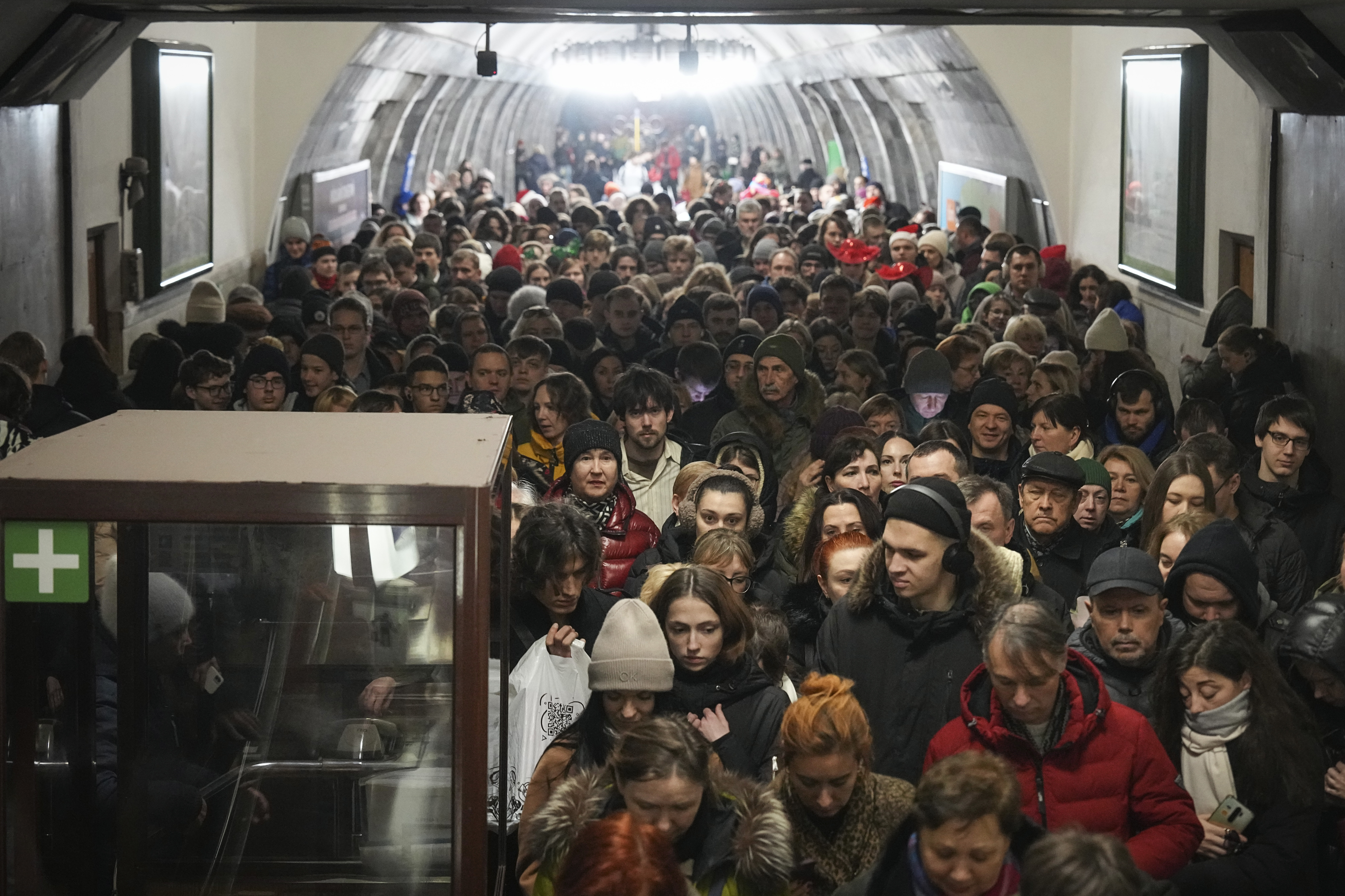 People take shelter in a metro station during an air raid alarm in Kyiv, Ukraine, Friday, Dec. 20, 2024. (AP Photo/Efrem Lukatsky)