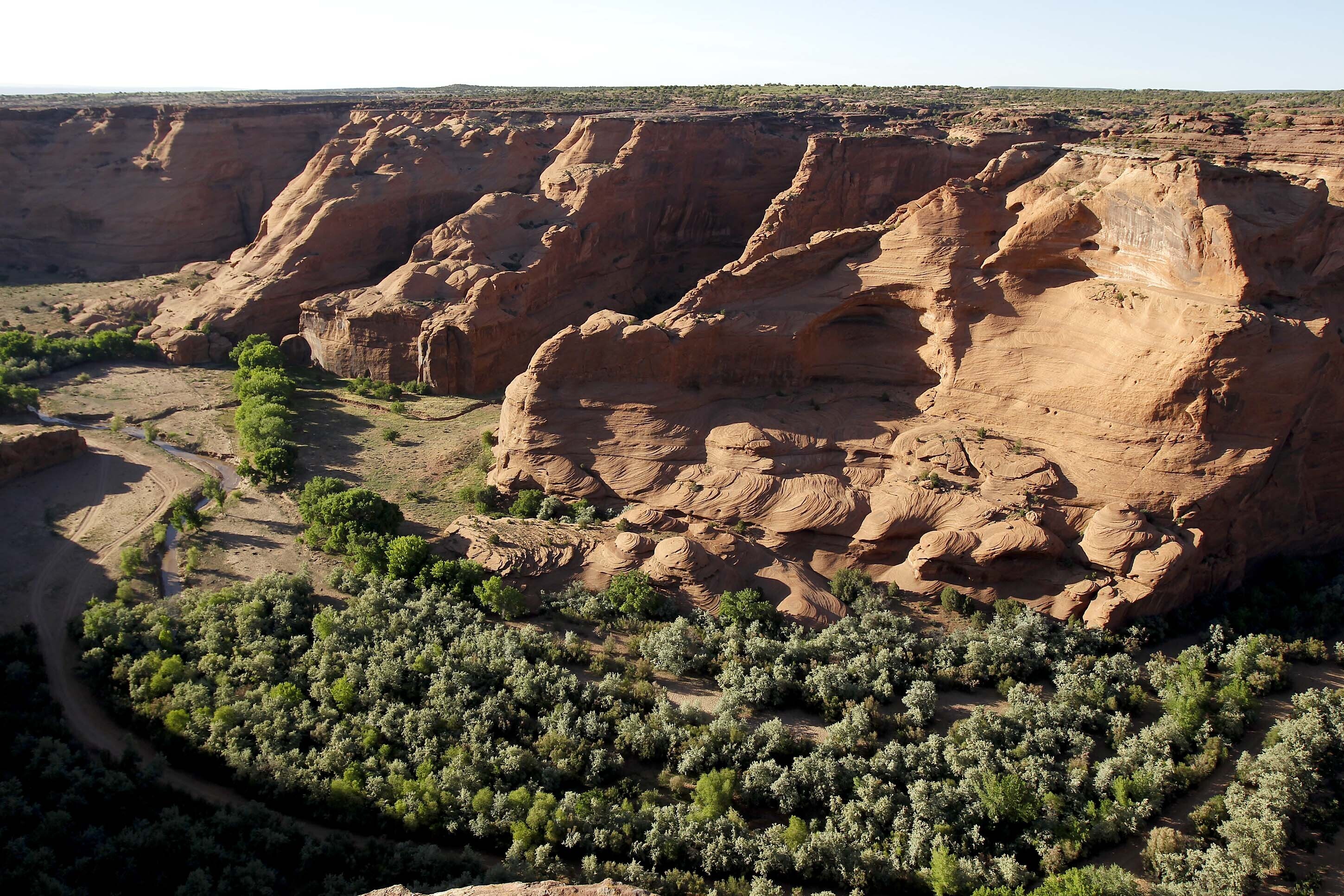 FILE - The vast landscape opens up inside Canyon de Chelly National Monument, May 30, 2010, near Chinle, Ariz. (AP Photo/Ross D. Franklin, File)