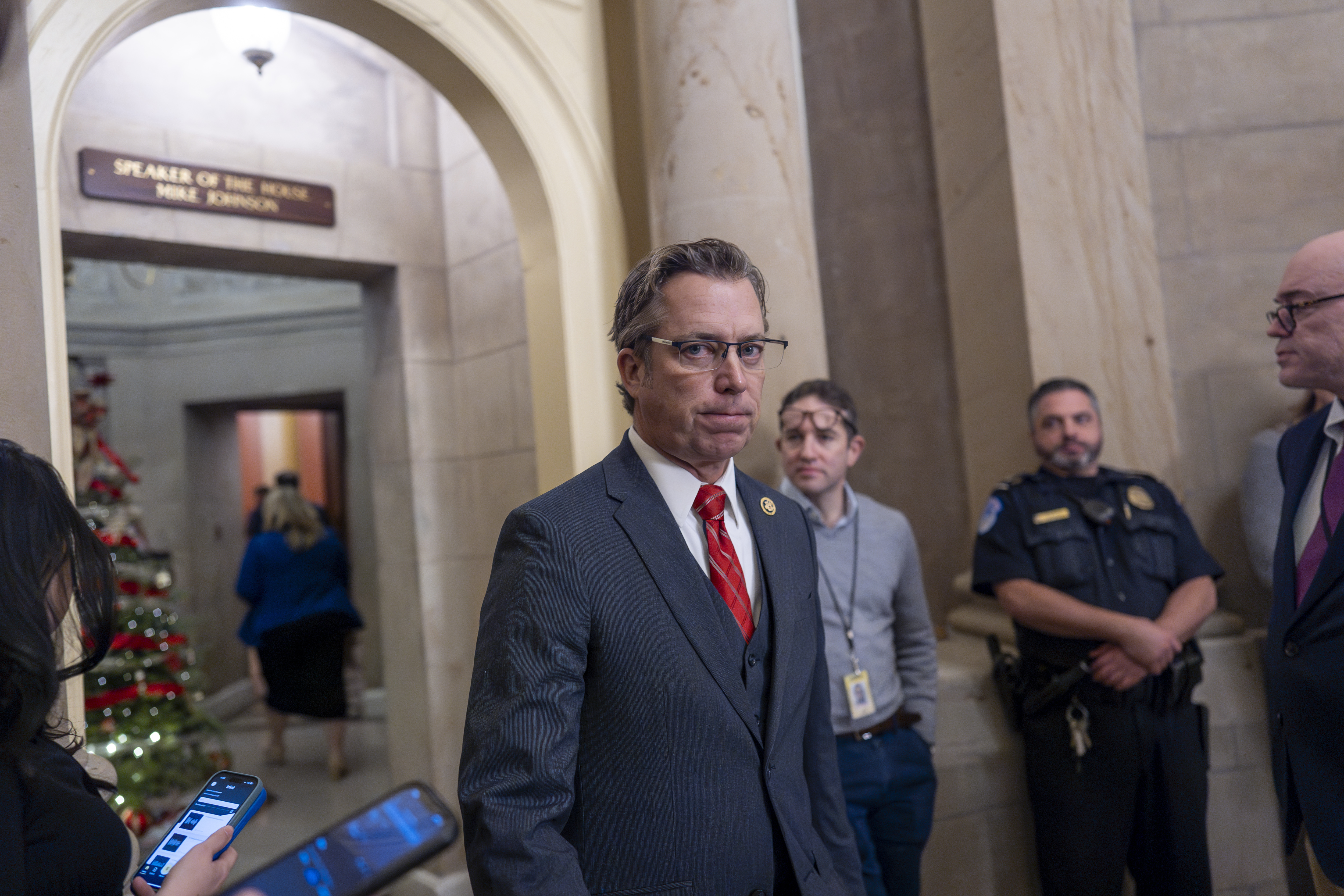 Rep. Andy Ogles, R-Tenn., arrives for a meeting with Speaker of the House Mike Johnson, R-La., at the Capitol in Washington, Friday, Dec. 20, 2024. (AP Photo/J. Scott Applewhite)