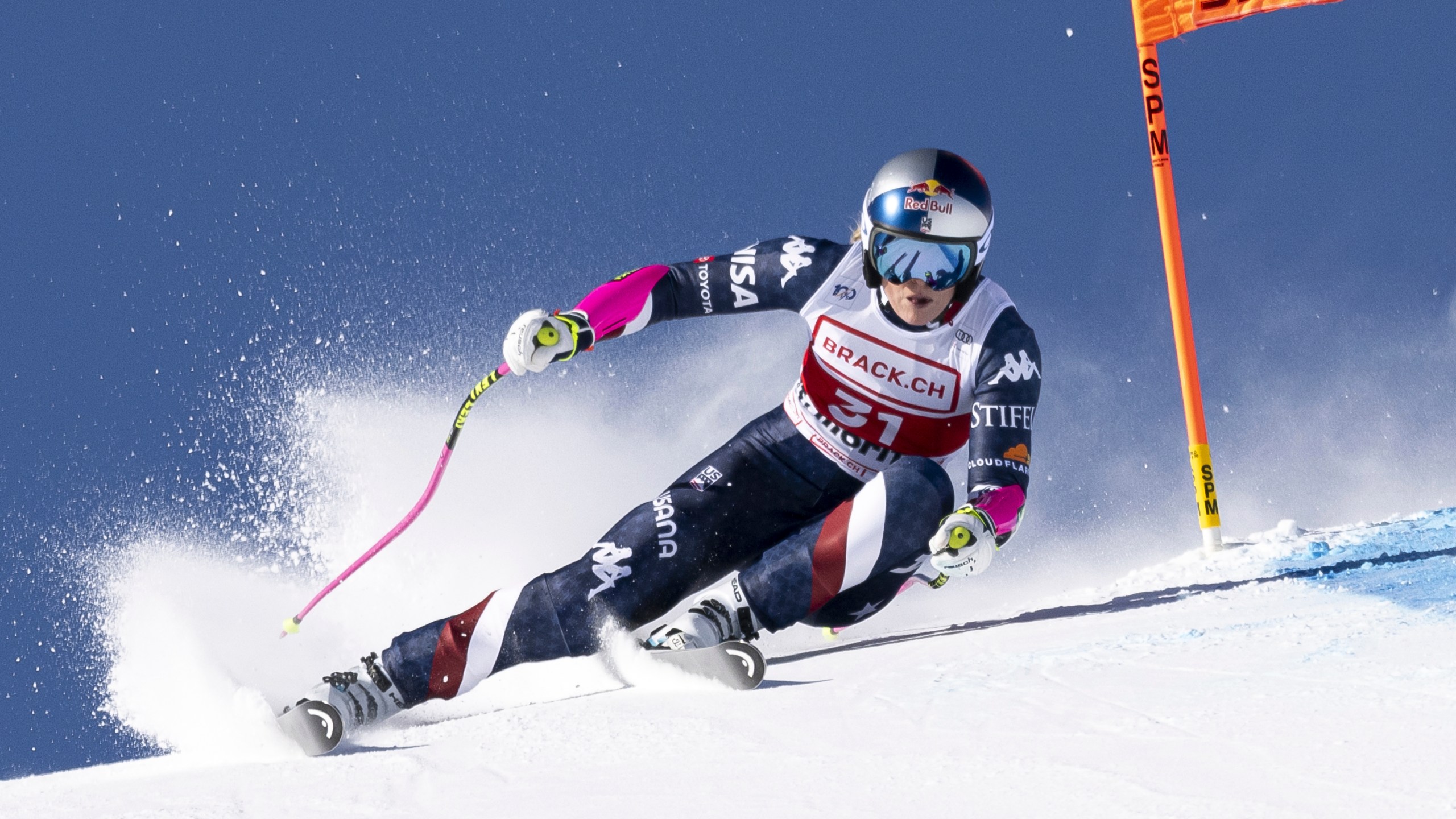 United States' Lindsey Vonn competes in an alpine ski, women's World Cup super G, in St. Moritz, Switzerland, Saturday, Dec. 21, 2024. (Jean-Christophe Bott/Keystone via AP)