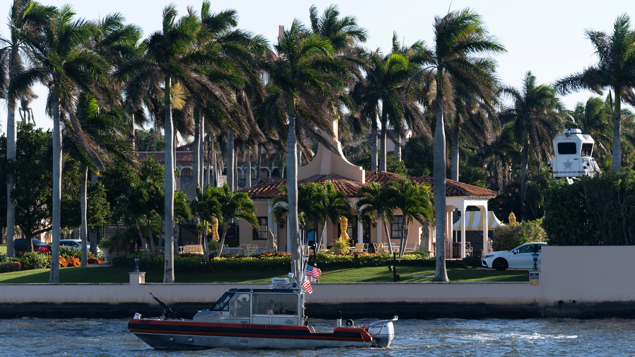 A Coast Guard patrol boat cruises near Mar-a-Lago, President-elect Donald Trump's Palm Beach home, in Palm Beach, Fla., Saturday, Dec. 21, 2024. (AP Photo/Manuel Balce Ceneta)