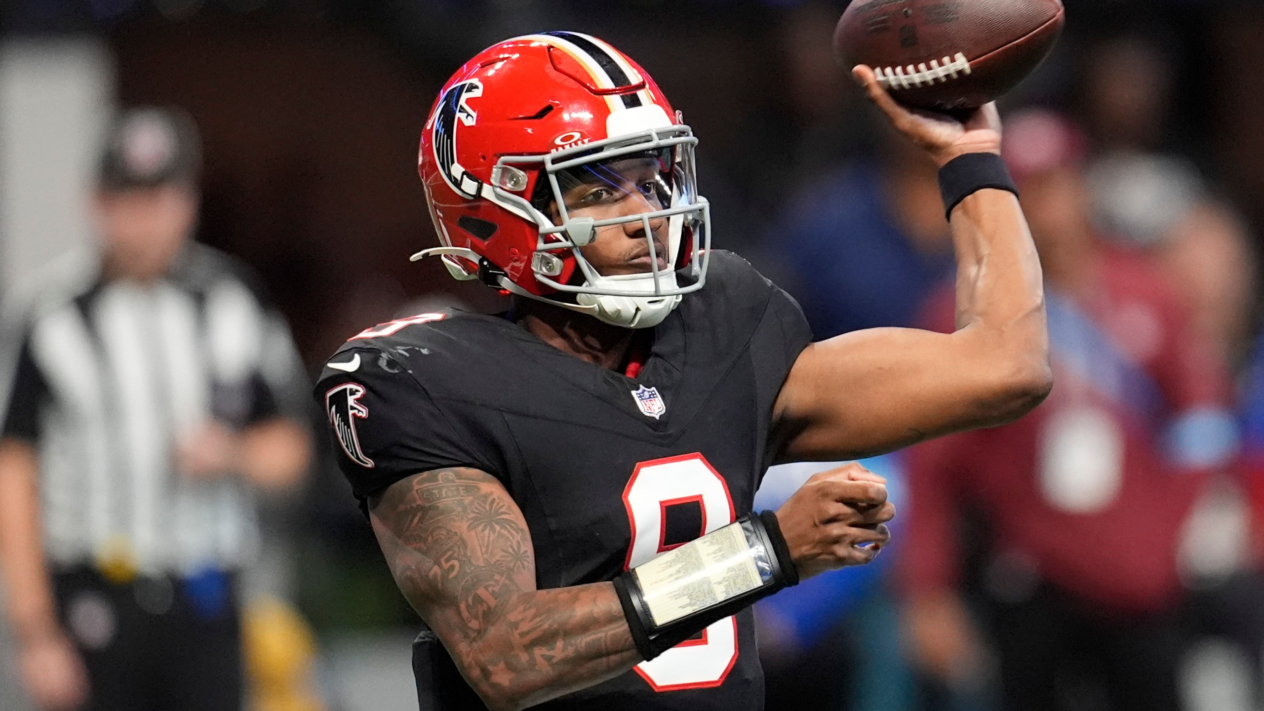 Atlanta Falcons quarterback Michael Penix Jr. (9) throws the ball in the second half of an NFL football game against the New York Giants in Atlanta, Sunday, Dec. 22, 2024. (AP Photo/Mike Stewart)