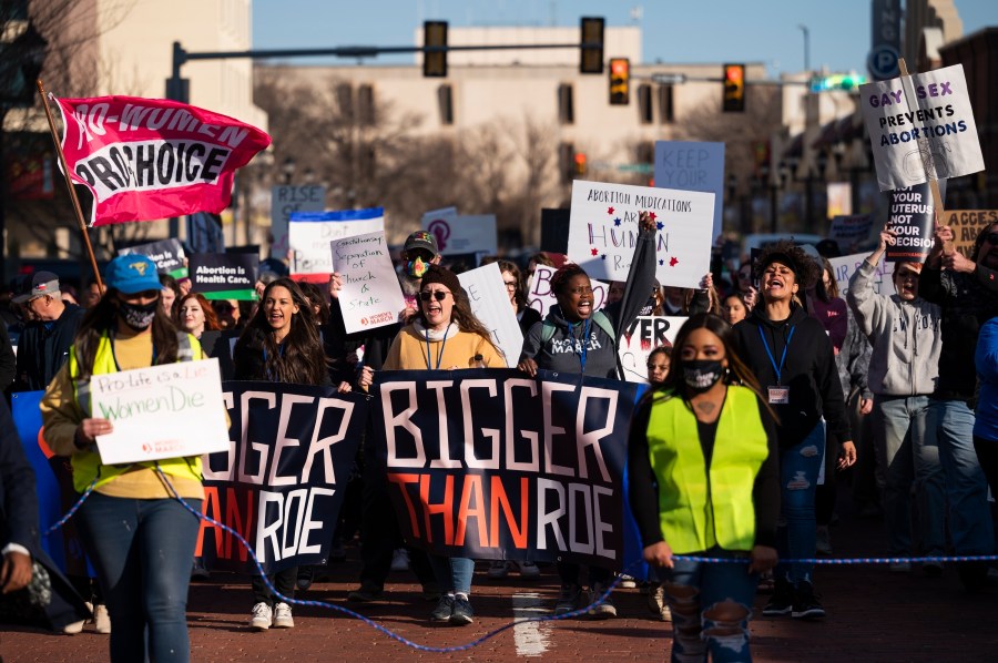 FILE - People march through downtown Amarillo to protest a lawsuit to ban the abortion drug mifepristone, Feb. 11, 2023, in Amarillo, Texas. (AP Photo/Justin Rex, File)