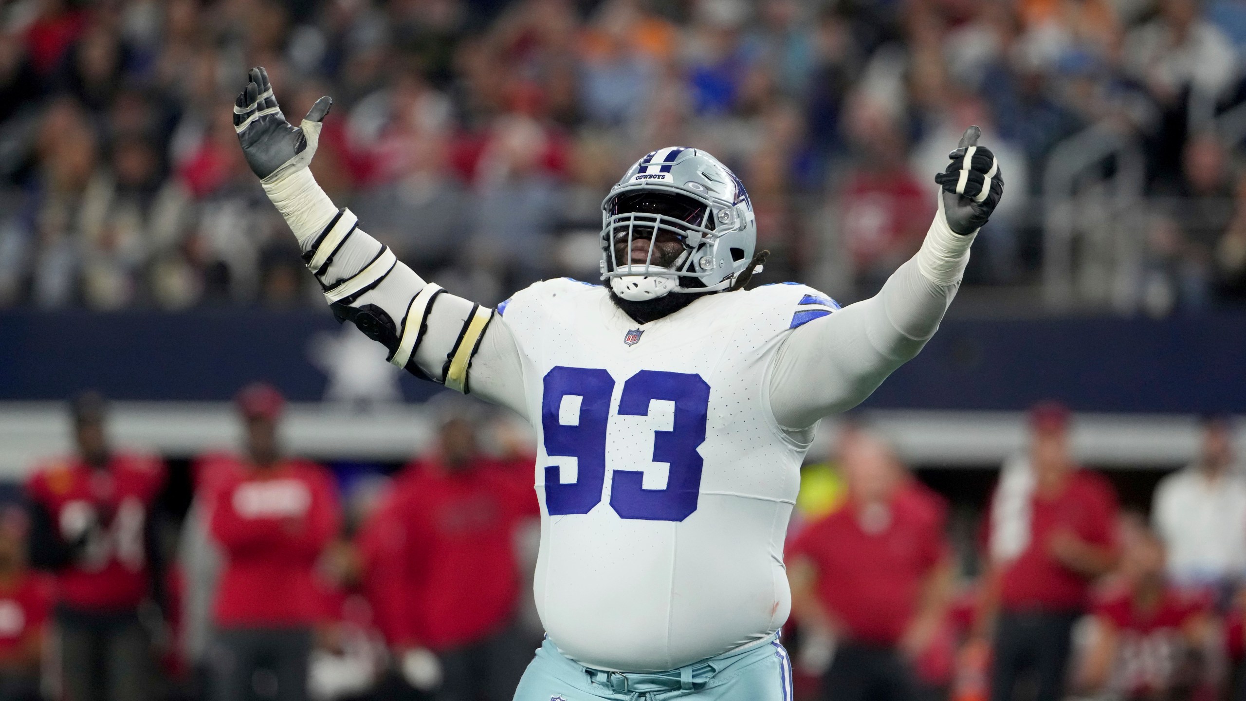 Dallas Cowboys defensive tackle Linval Joseph celebrates a sack of Tampa Bay Buccaneers quarterback Baker Mayfield in the second half of an NFL football game in Arlington, Texas, Sunday, Dec. 22, 2024. (AP Photo/Jeffrey McWhorter)