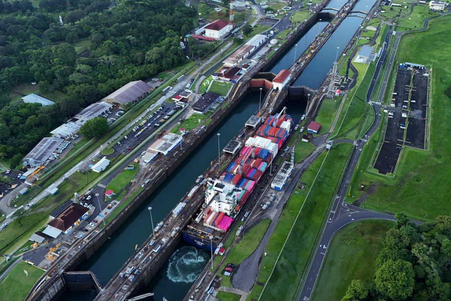 FILE - A cargo ship traverses the Agua Clara Locks of the Panama Canal in Colon, Panama, Sept. 2, 2024. (AP Photo/Matias Delacroix, File)