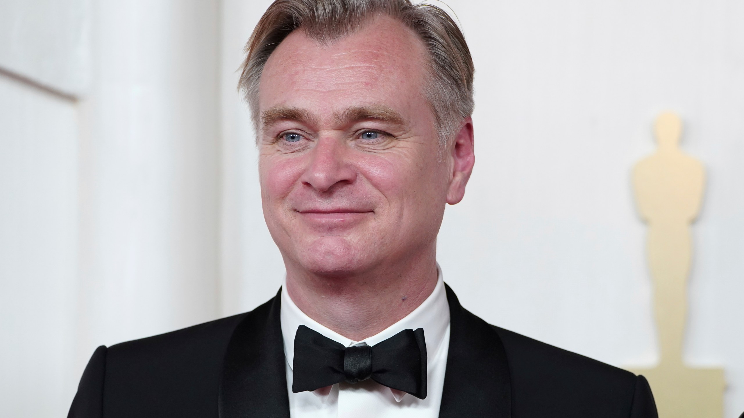 FILE - Christopher Nolan arrives at the Oscars on Sunday, March 10, 2024, at the Dolby Theatre in Los Angeles. (Photo by Jordan Strauss/Invision/AP, File)