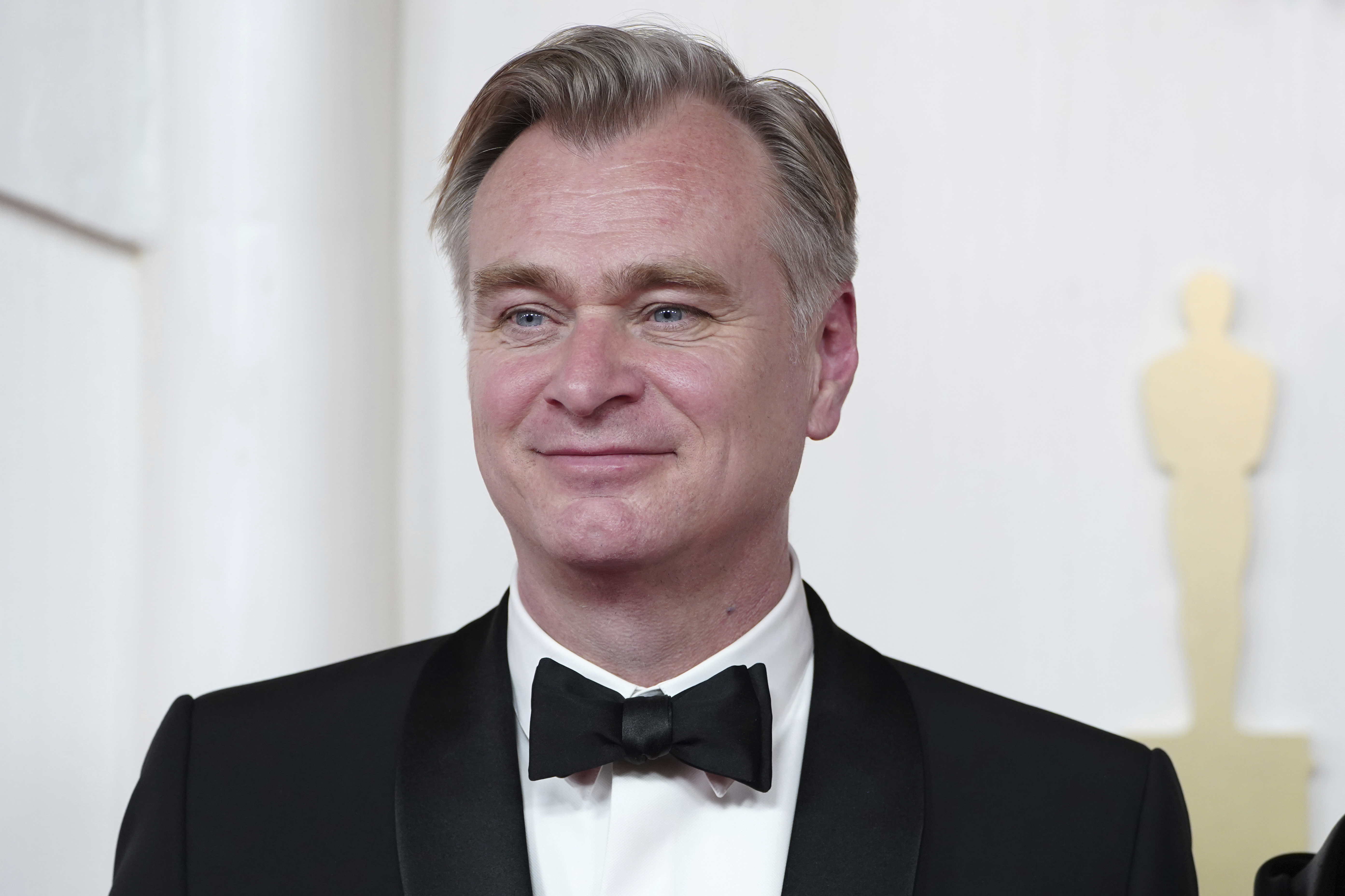 FILE - Christopher Nolan arrives at the Oscars on Sunday, March 10, 2024, at the Dolby Theatre in Los Angeles. (Photo by Jordan Strauss/Invision/AP, File)