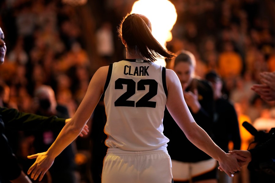 FILE - Iowa guard Caitlin Clark walks on the court during player introductions before an NCAA college basketball game against Nebraska, Saturday, Jan. 27, 2024, in Iowa City, Iowa. (AP Photo/Charlie Neibergall, File)