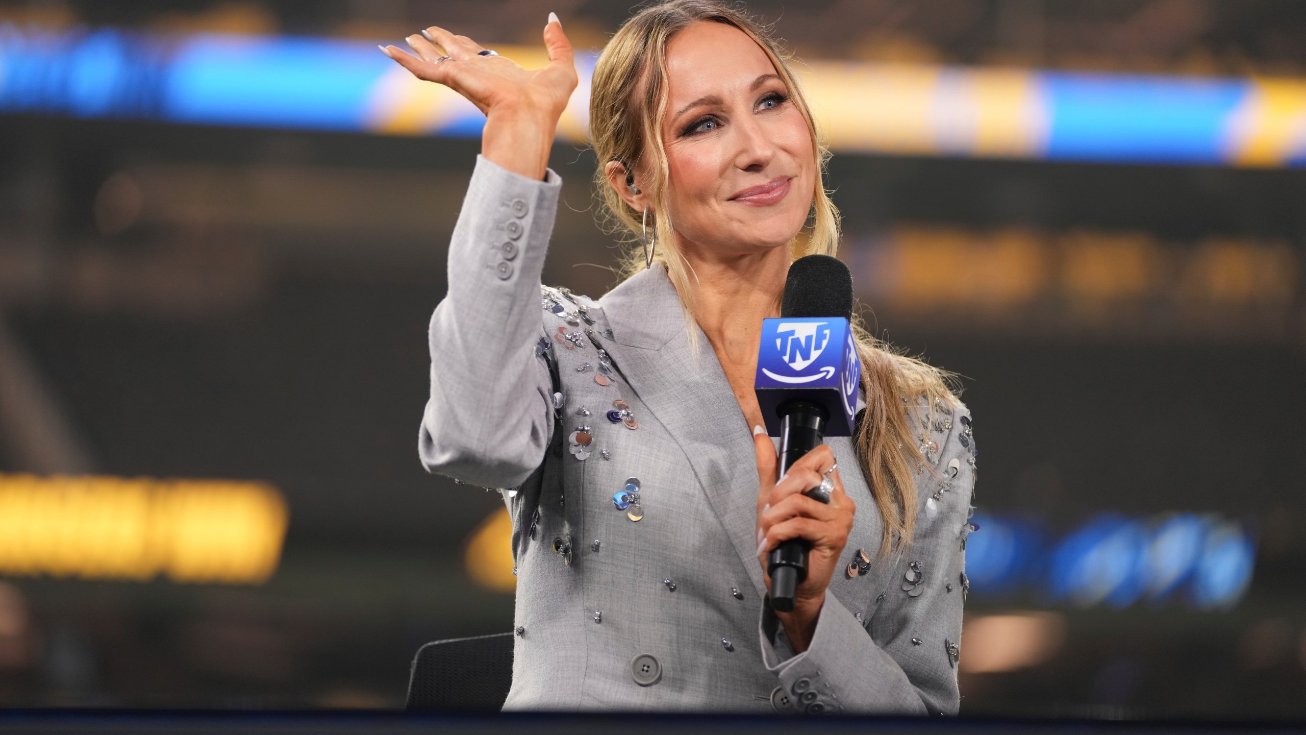 Nikki Glaser participates in a segment after an NFL football game between the Los Angeles Chargers and the Denver Broncos, Thursday, Dec. 19, 2024, in Inglewood, Calif. (AP Photo/Eric Thayer)