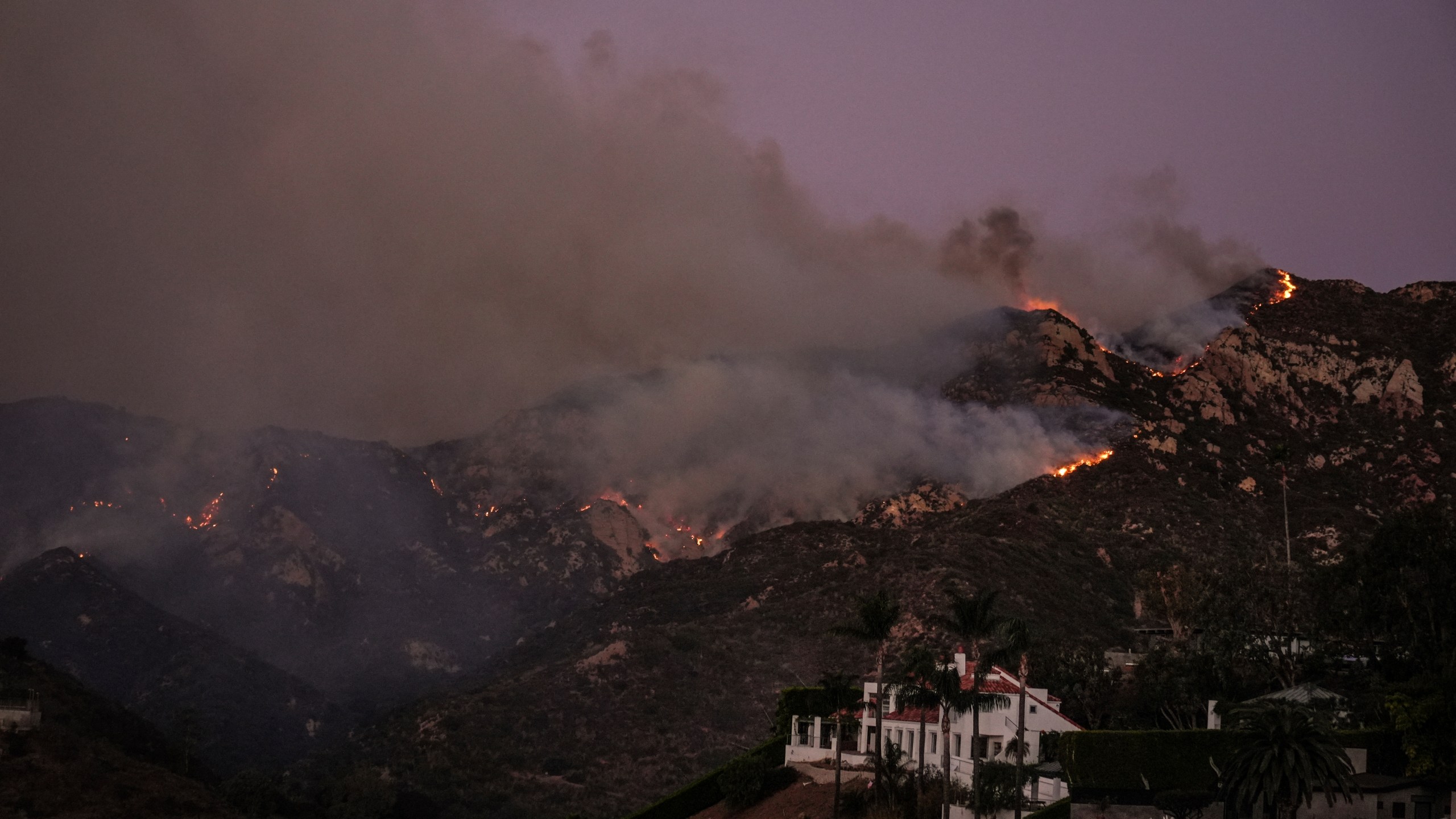 FILE - The Franklin Fire burns in Malibu, Calif., Dec. 10, 2024. (AP Photo/Jae C. Hong, File)