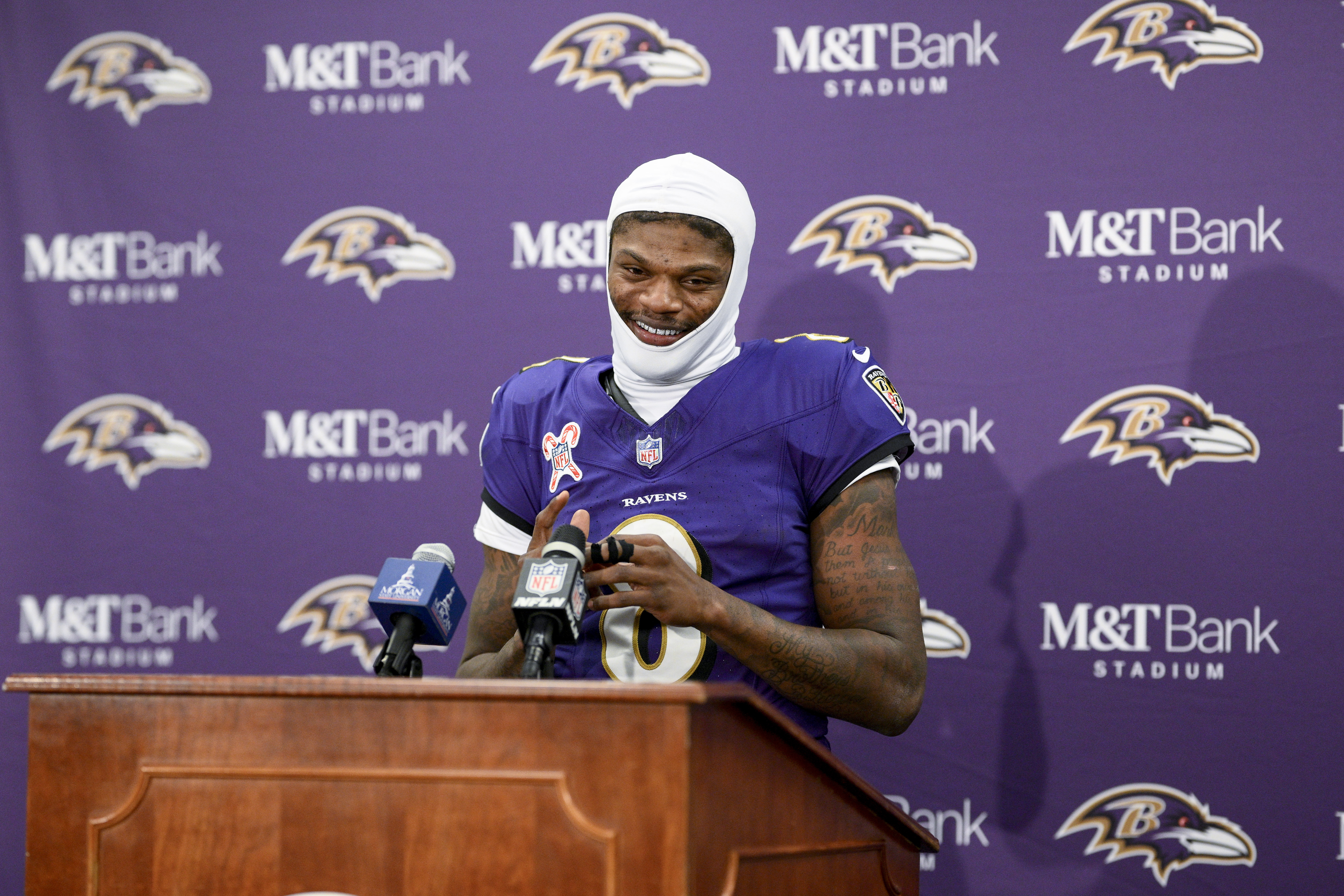 Baltimore Ravens quarterback Lamar Jackson talks to reporters following an NFL football game against the Pittsburgh Steelers, Saturday, Dec. 21, 2024, in Baltimore. The Ravens won 34-17. (AP Photo/Nick Wass)