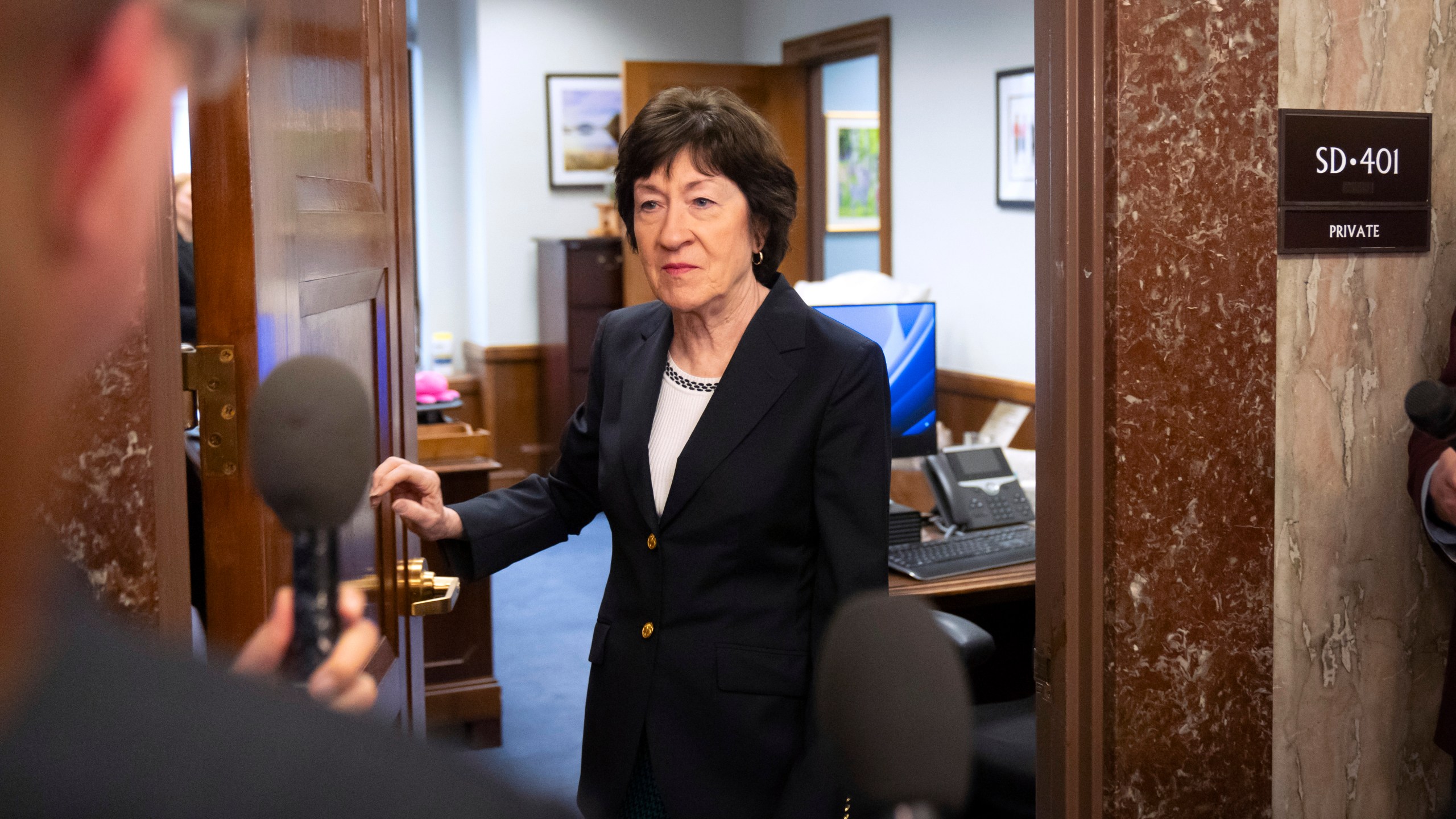 Sen. Susan Collins, R-Maine, speaks with reporters after meeting with Pete Hegseth, President-elect Donald Trump's choice to be defense secretary, on Capitol Hill, Wednesday, Dec. 11, 2024, in Washington. (AP Photo/Mark Schiefelbein)