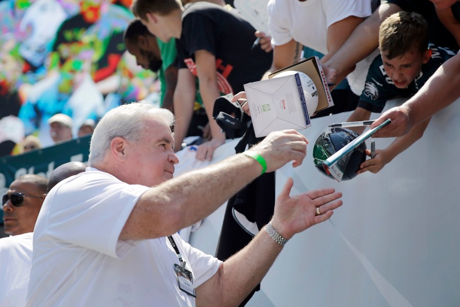 FILE - Former Philadelphia Eagles player Bill Bergey signs autographs for fans at the Eagles' NFL football training camp, Tuesday, Aug. 4, 2015, in Philadelphia. (AP Photo/Matt Rourke, File)