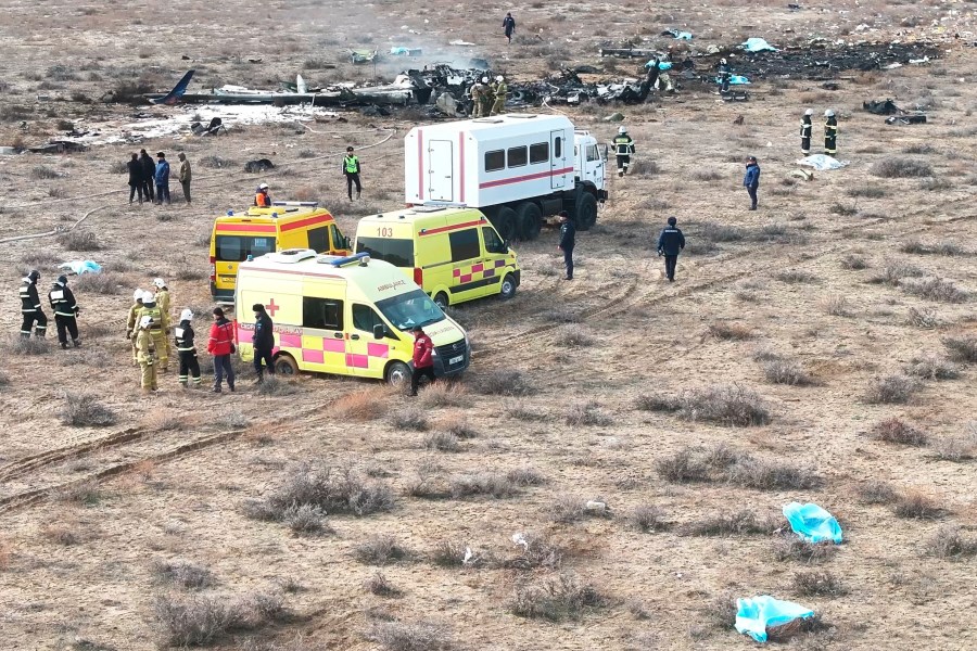 The wreckage of Azerbaijan Airlines Embraer 190 lays on the ground near the airport of Aktau, Kazakhstan, Wednesday, Dec. 25, 2024. (AP Photo/Azamat Sarsenbayev)