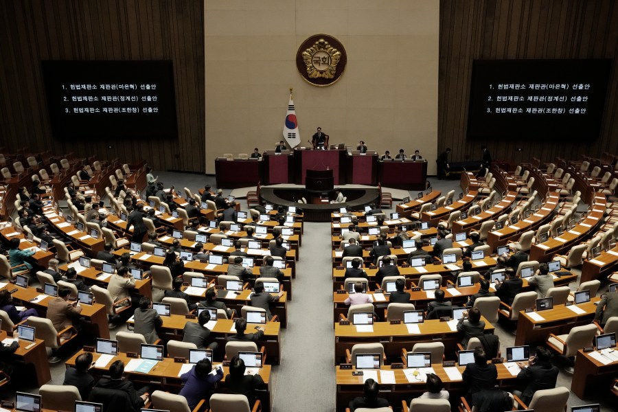 Lawmakers participate in the plenary session at the National Assembly in Seoul, South Korea, Thursday, Dec. 26, 2024. (AP Photo/Ahn Young-joon)