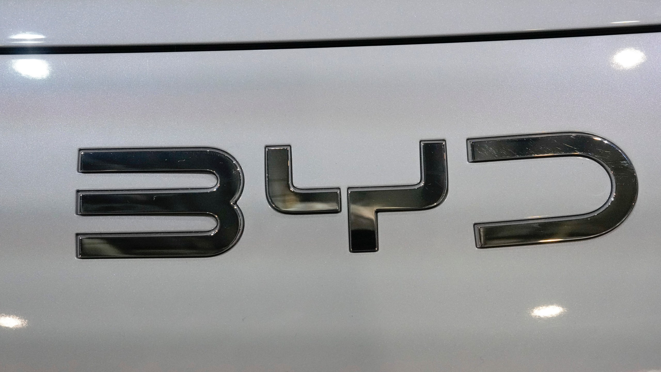 FILE - The BYD logo is photographed at the Paris Auto Show in Paris, Oct. 15, 2024. (AP Photo/Michel Euler, File)