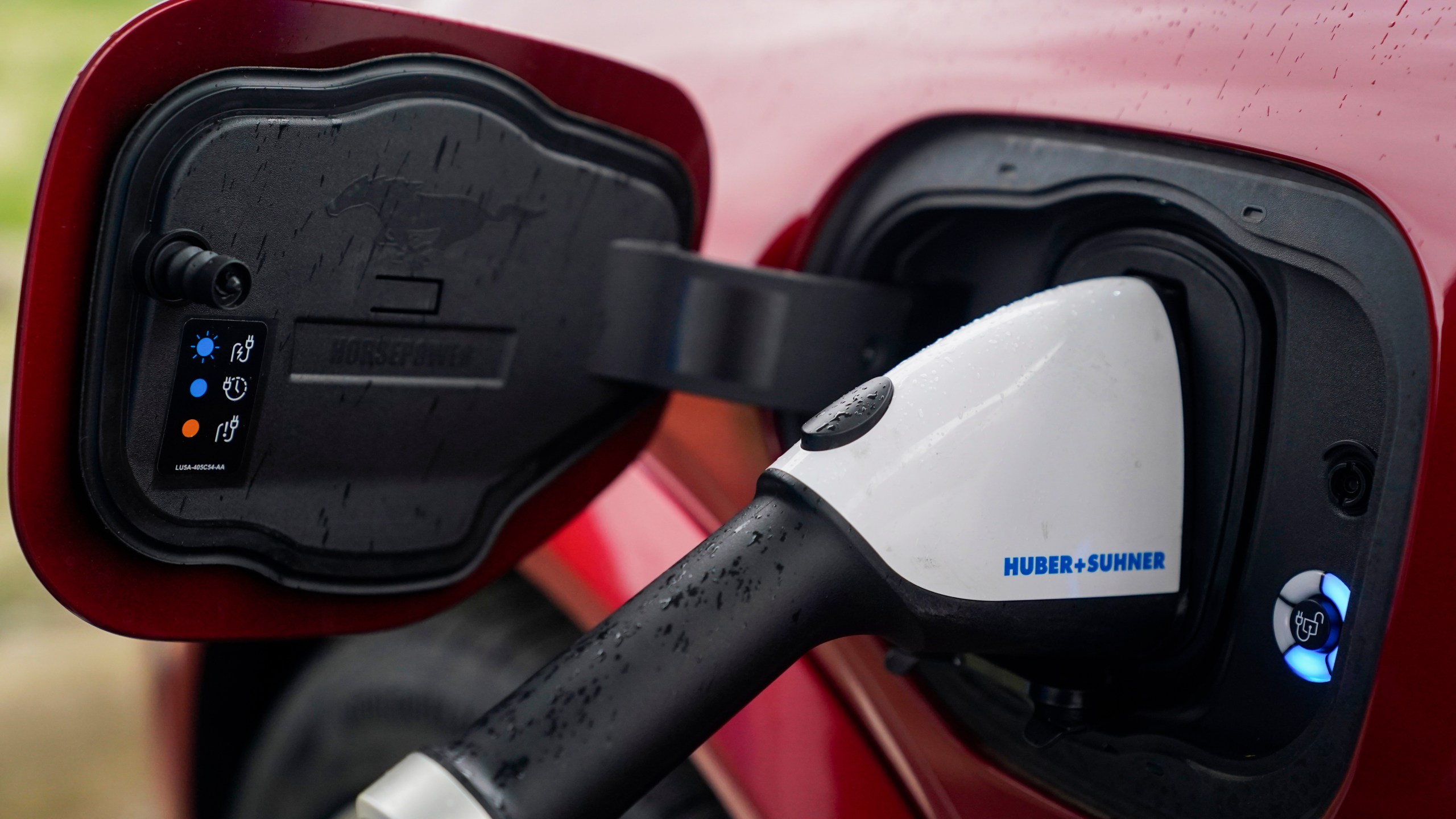 FILE - A 2023 Ford Mustang Mach-E charges, March 8, 2024, at an electric vehicle charging station in London, Ohio. (AP Photo/Joshua A. Bickel, File)