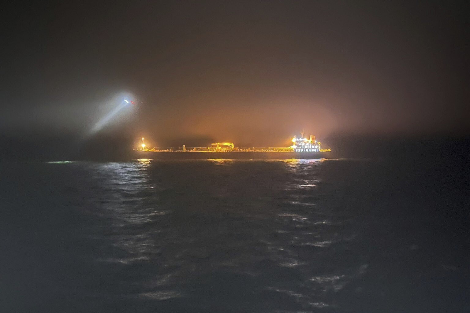 This photo provided by Rajavartiosto (Finnish Border Guard) on Thursday, Dec. 26, 2024, shows the oil tanker Eagle S at sea outside Porkkalanniemi, Finland. The Eagle S was sailing at the same time in the area where the Finland-Estonia electrical link was disrupted on Wednesday. (Rajavartiosto via AP)