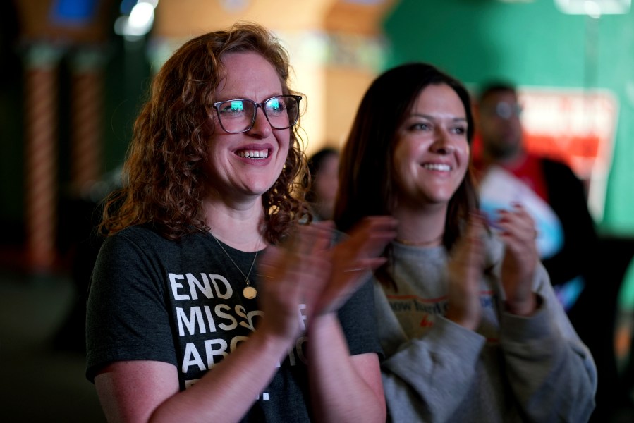 FILE - People only giving there first names Erika, left, and Leeann react after an abortion rights amendment to the Missouri constitution passed, Tuesday, Nov. 5, 2024, at a watch party in Kansas City, Mo. (AP Photo/Charlie Riedel, File)