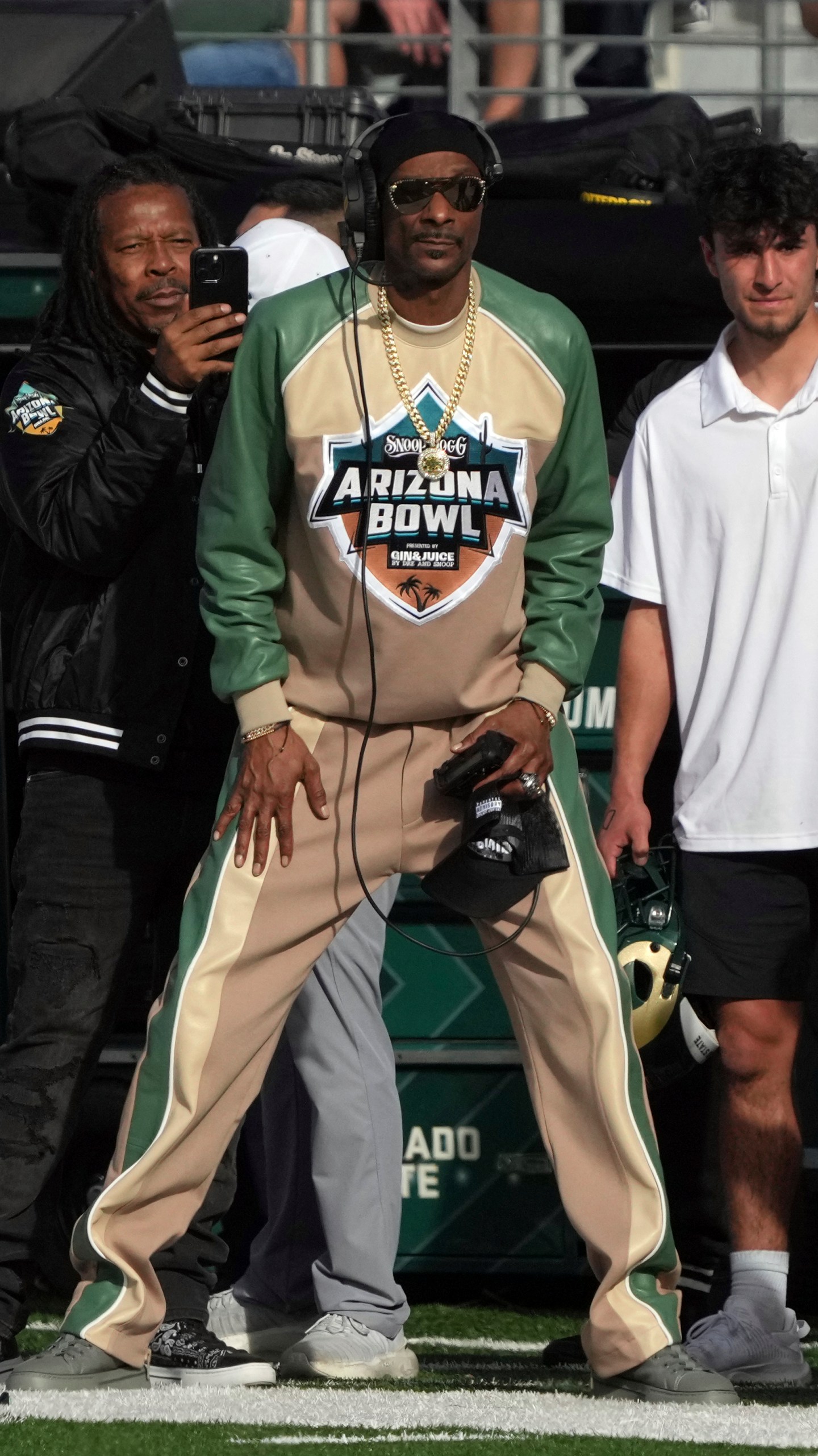 Snoop Dogg watches the play between Colorado State and Miami (Ohio) in the first half of the Arizona Bowl NCAA college football game, Saturday, Dec. 28, 2024, in Tucson, Ariz.