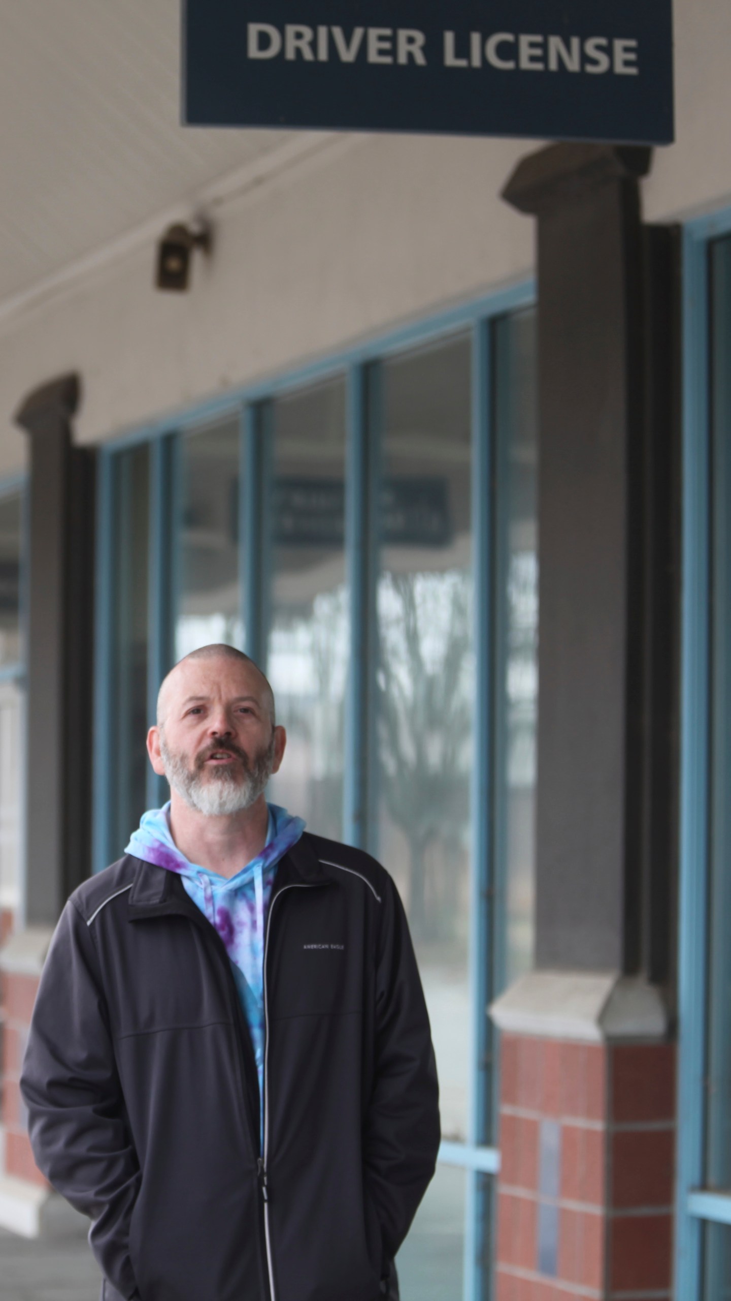 Steven Fish, of Garnett, Kan., visits the strip mall where he was unable to register to vote because of a proof-of-citizenship law that was later struck down by the federal courts, Monday, Dec. 9, 2024, in Lawrence, Kan. (AP Photo/John Hanna)