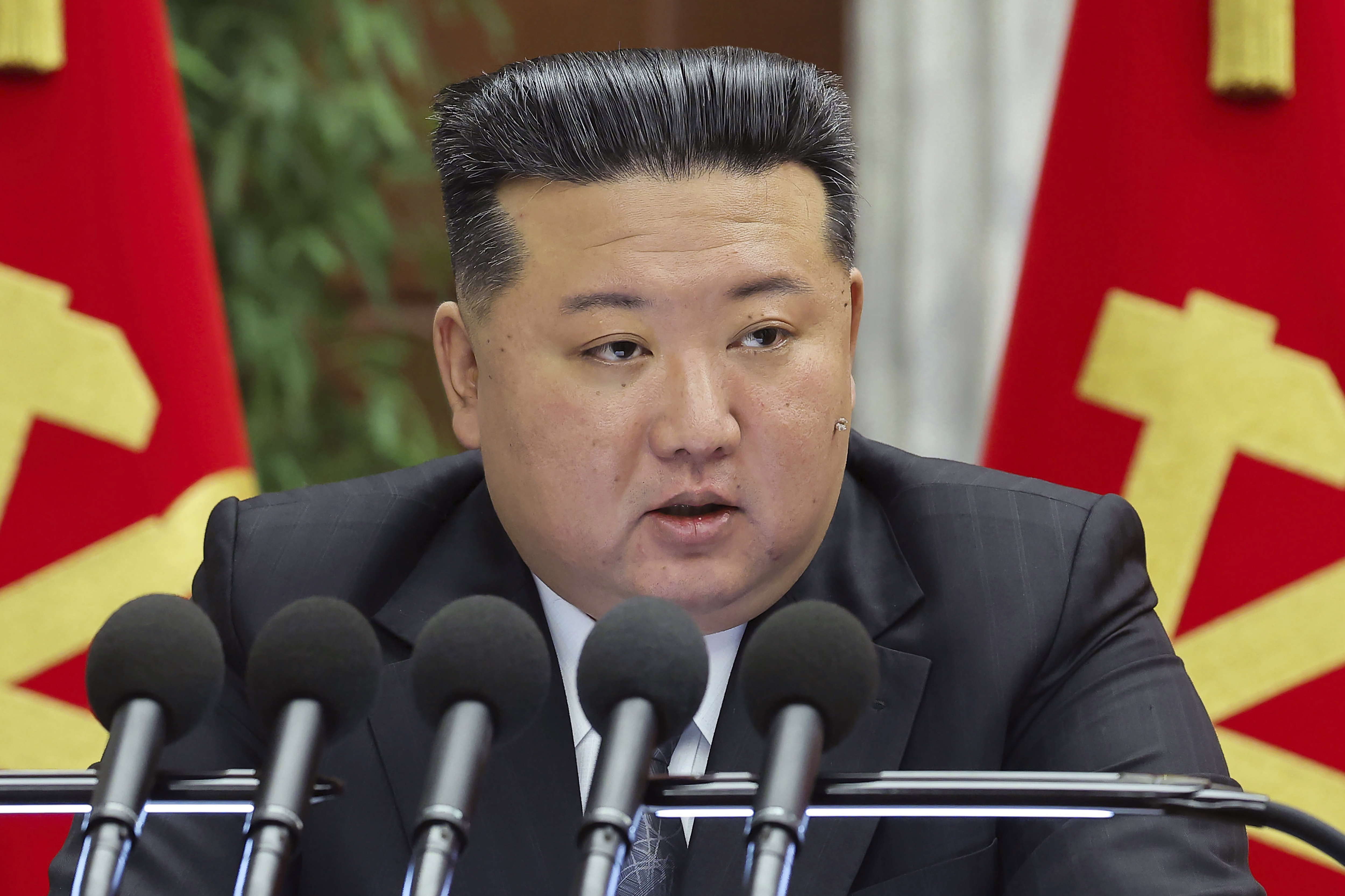 In this photo provided by the North Korean government, North Korean leader Kim Jong Un delivers a speech at a meeting held during Dec. 23 until Dec. 27, 2024, in Pyongyang, North Korea. Independent journalists were not given access to cover the event depicted in this image distributed by the North Korean government. The content of this image is as provided and cannot be independently verified. (Korean Central News Agency/Korea News Service via AP)