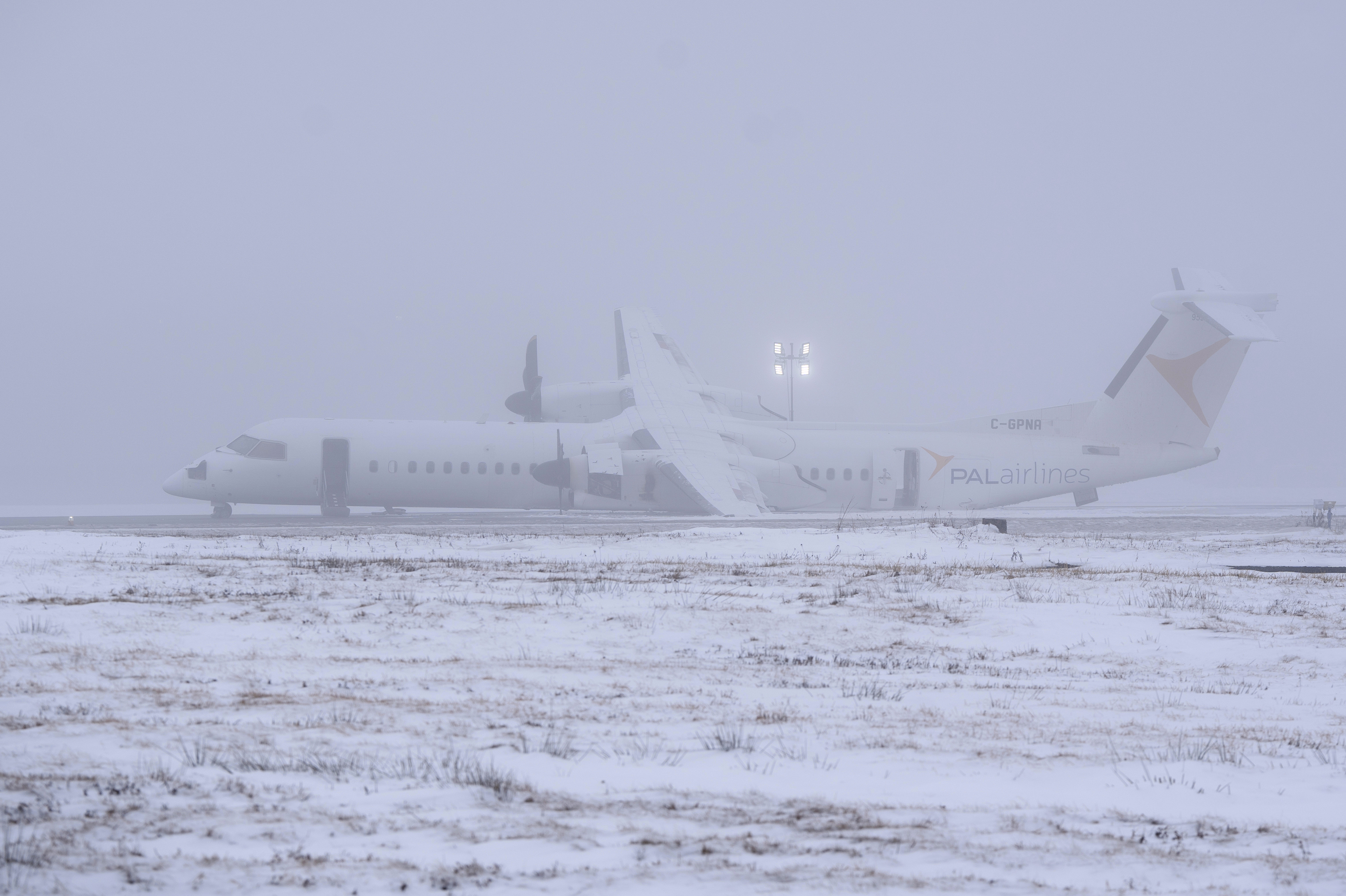 An Air Canada Express flight operated by Pal Airlines skidded off the runway Saturday night, after catching fire at Halifax Stanfield International Airport is seen on Sunday, Dec. 29, 2024, in Halifax, Nova Scotia. (Darren Calabrese/The Canadian Press via AP)