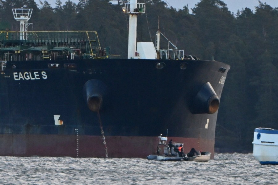 Finnish Coast Guard stopped a small boat which tried to reach the Cook Islands-registered oil tanker Eagle S anchored near the Kilpilahti port in Porvoo, on the Gulf of Finland, Monday, Dec. 30, 2024. (Jussi Nukari/Lehtikuva via AP)