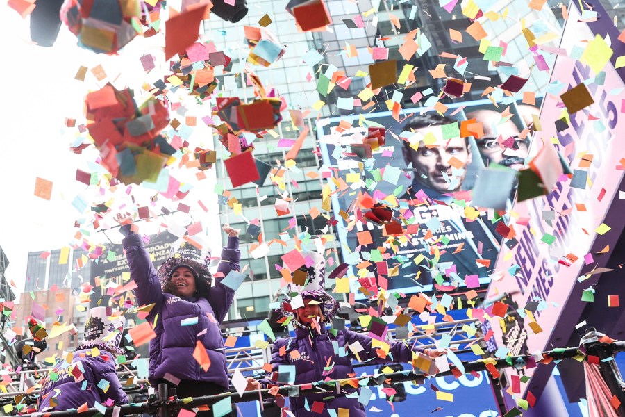 Organizers throw confetti ahead of New Year's Eve in Times Square, Sunday, Dec. 29, 2024, in New York. (AP Photo/Heather Khalifa)