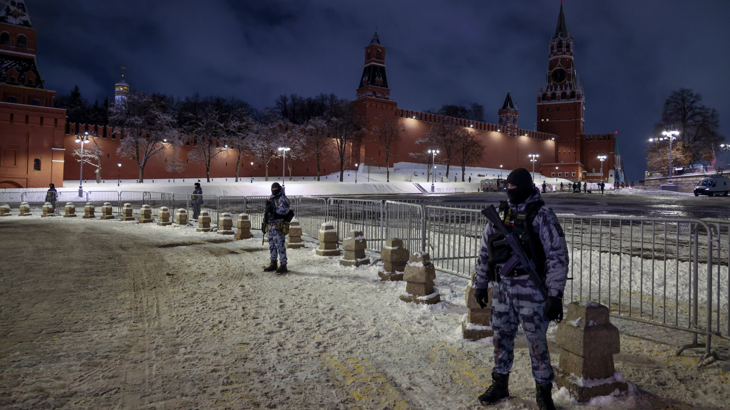 Servicemen of Rosguardia (National Guard) guard an area near Red Square prior to celebrating the New Year's Day, in Moscow, Russia, Tuesday, Dec. 31, 2024. (AP Photo)