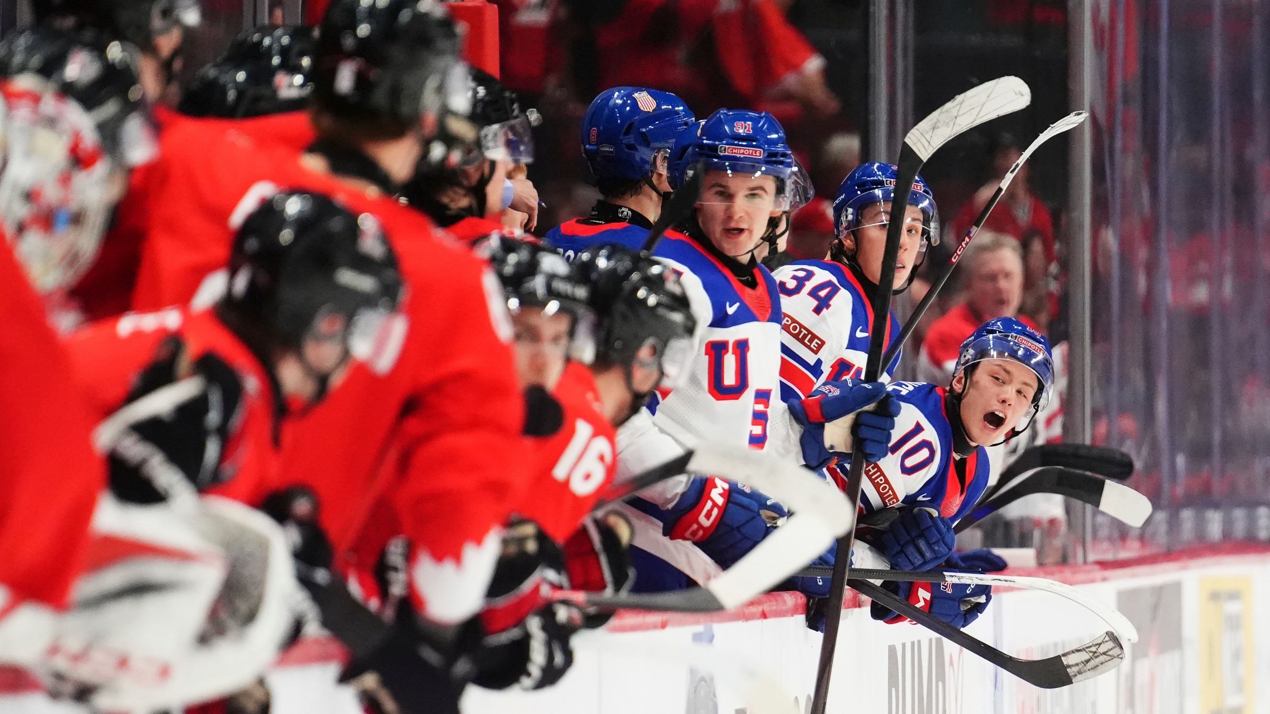 United States' Carey Terrance (10) shout to the Canada bench during third-period IIHF World Junior Hockey Championship tournament game action in Ottawa, Ontario, Tuesday, Dec. 31, 2024. (Sean Kilpatrick/The Canadian Press via AP)