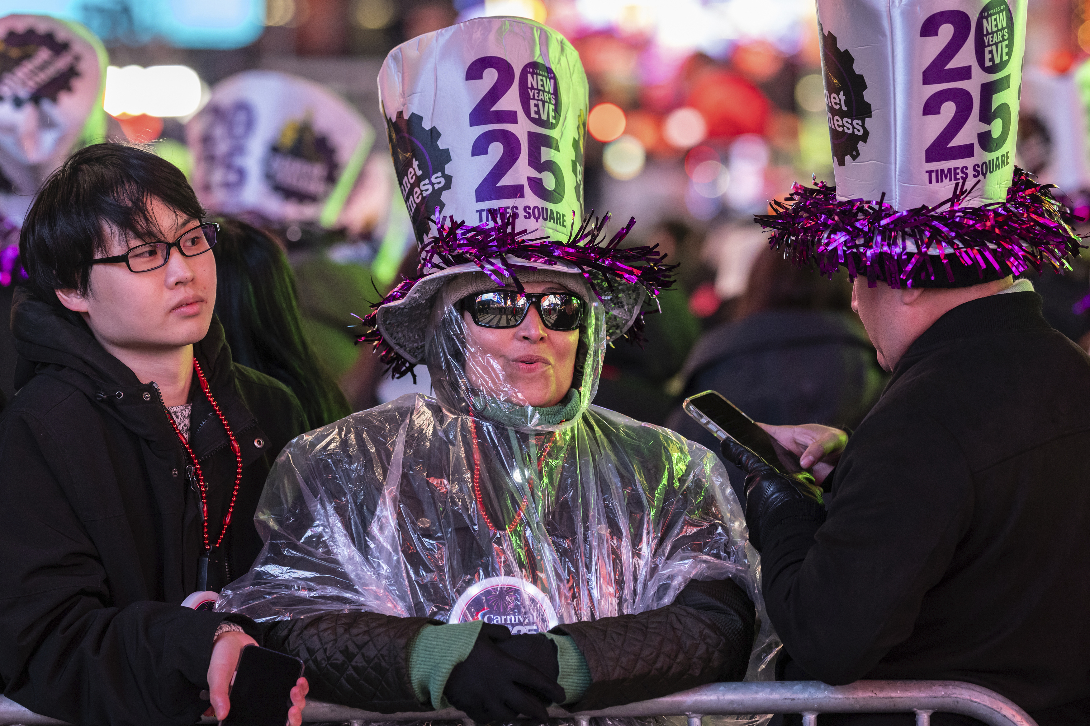 Revelers celebrate in New York's Times Square as they attend a New Year's Eve celebration, Tuesday, Dec. 31, 2024, in New York. (AP Photo/Stefan Jeremiah)