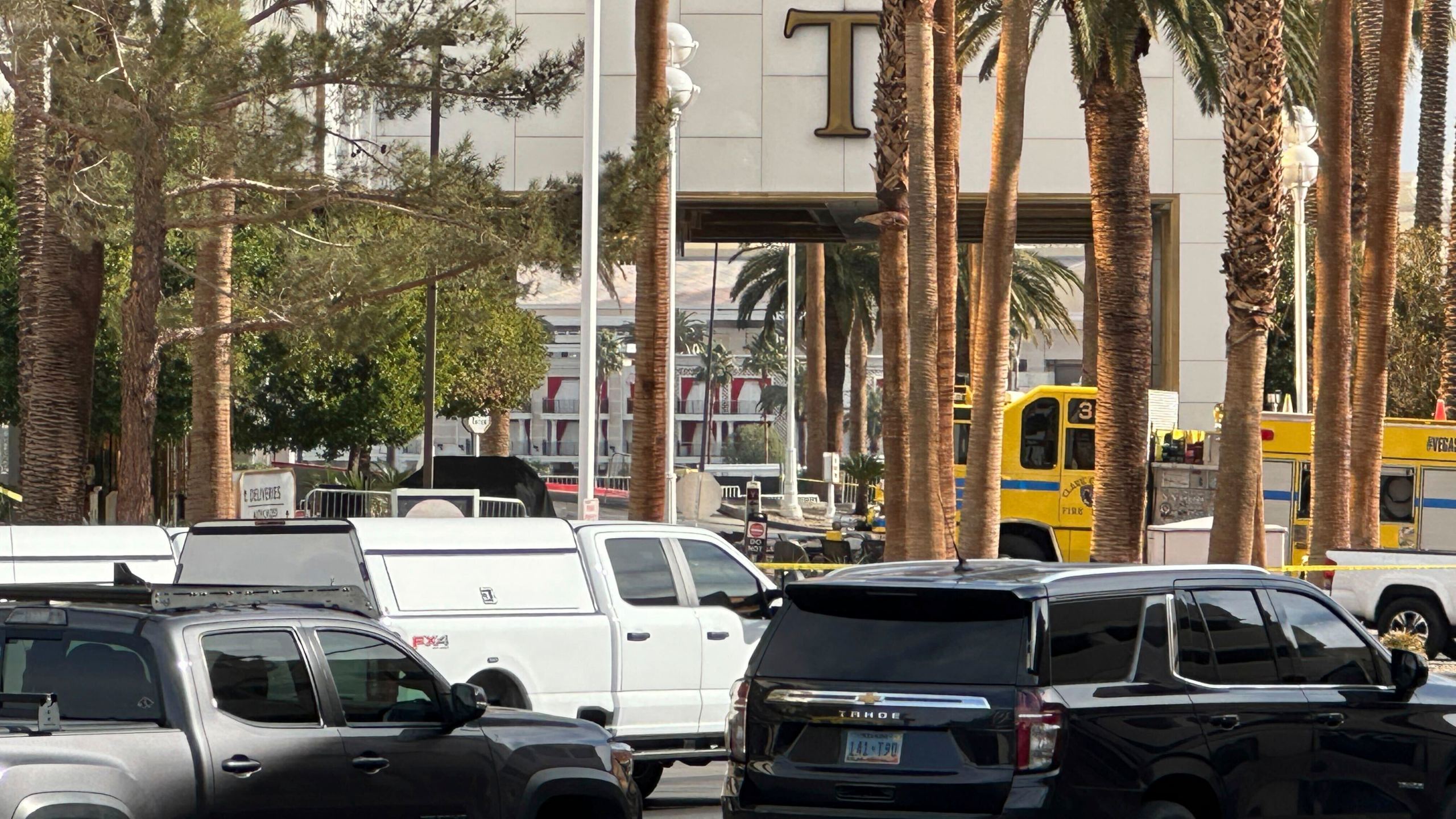 Police block the area after a vehicle caught fire and exploded outside the lobby of President-elect Donald Trump's hotel Wednesday, Jan. 1, 2025. (AP Photo/Ty ONeil)