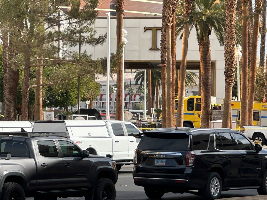 Police block the area after a vehicle caught fire and exploded outside the lobby of President-elect Donald Trump's hotel Wednesday, Jan. 1, 2025. (AP Photo/Ty ONeil)