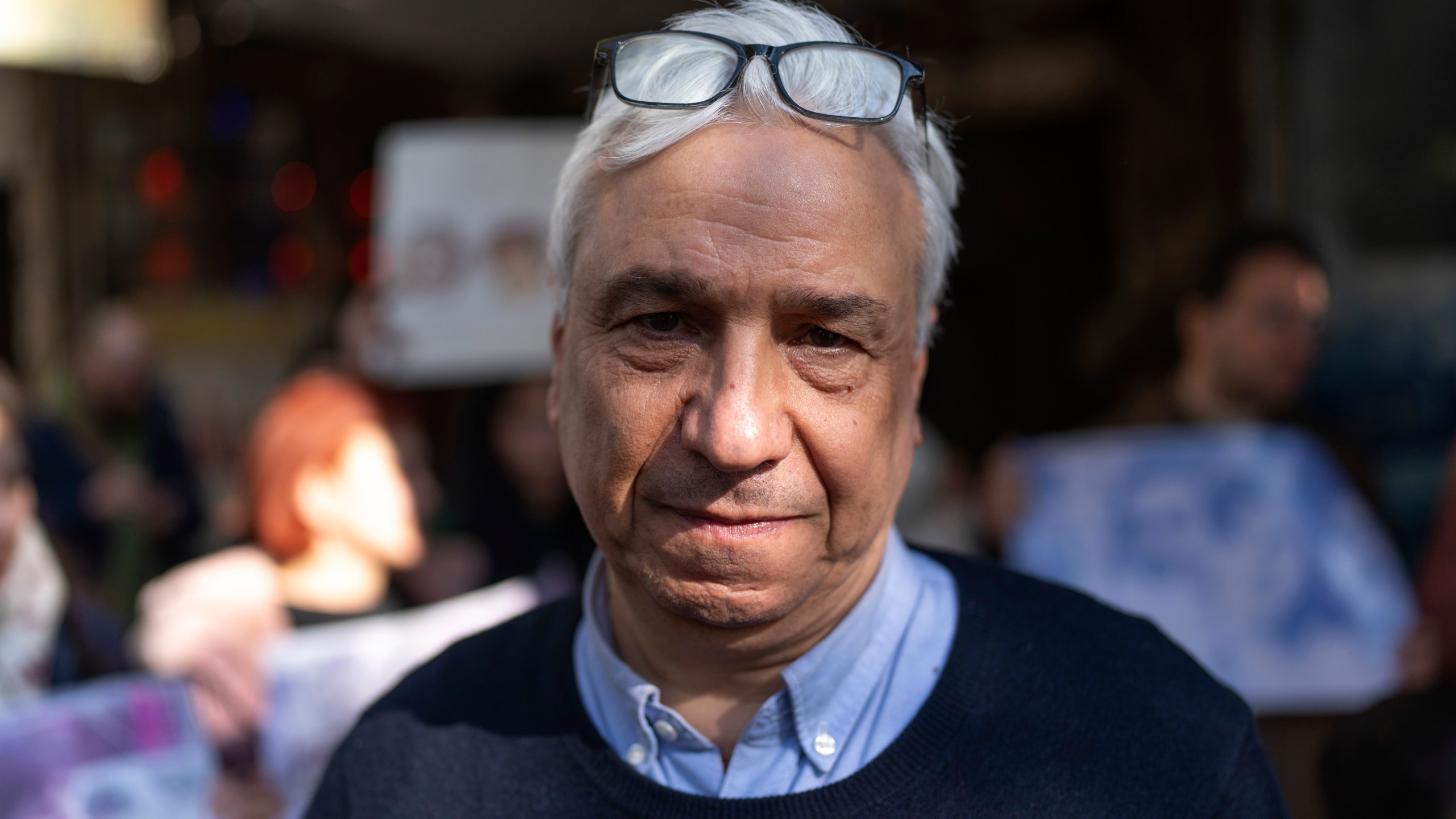 Syrian author Yassin Haj Saleh, husband of Samira Alkhalil, who disappeared during the war between opposition forces and Assad regime, takes part in a protest demanding answers to the whereabouts of her and other activists, in Douma, Syria, Wednesday, Jan. 1, 2025. (AP Photo/Mosa'ab Elshamy)