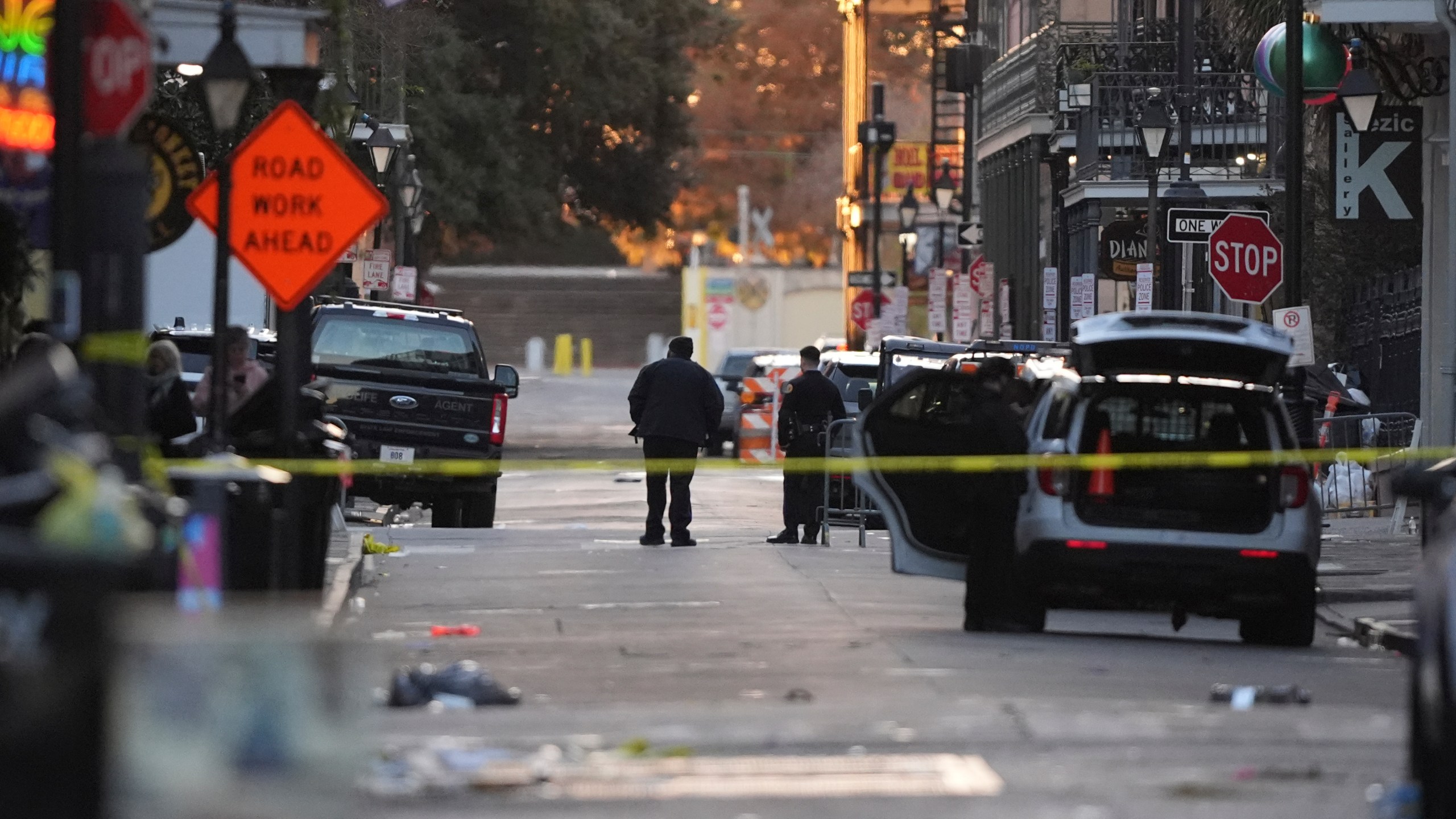 Emergency services attend the scene after a vehicle drove into a crowd on New Orleans' Canal and Bourbon Street, Wednesday Jan. 1, 2025. (AP Photo/Gerald Herbert)