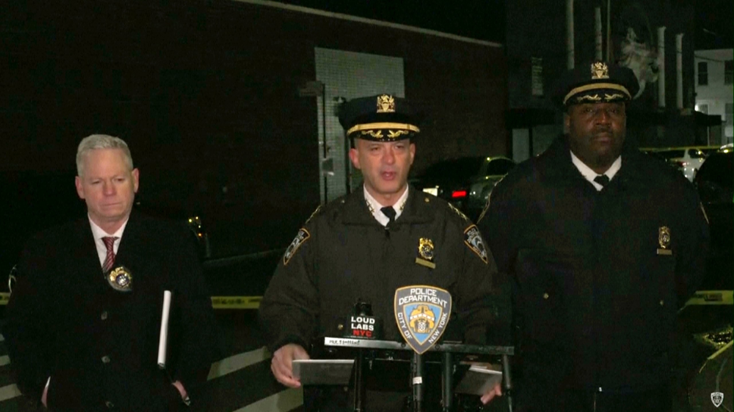 In this grab taken from a video provided by the New York Police Department, Chief of Patrol Philip Rivera, centre, speaks to the media during a press conference in New York, early Thursday, Jan. 2, 2025, the day after a shooting outside a nightclub in Queens. (NYPD via AP)