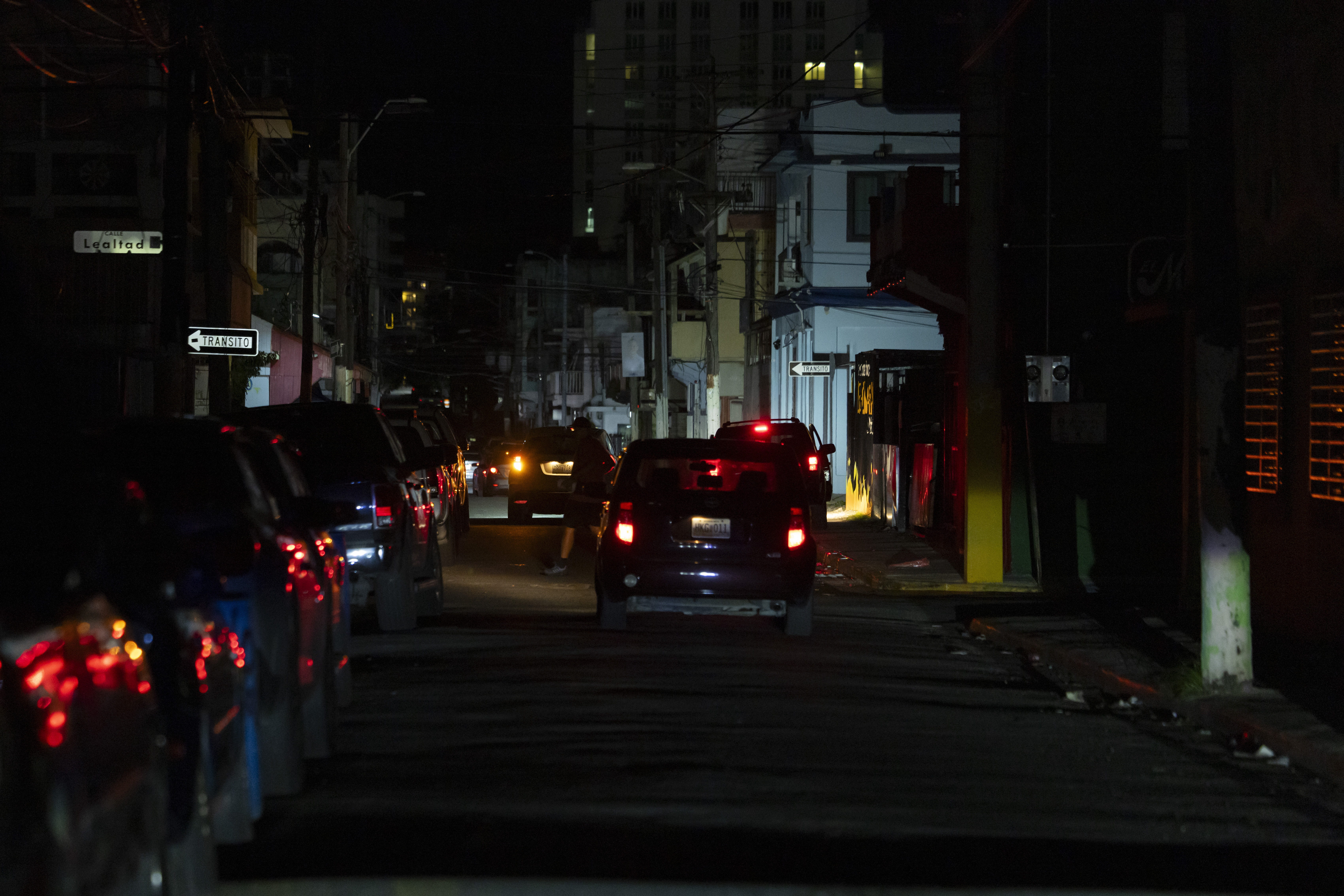 A street is dark during a blackout in San Juan, Puerto Rico, after sunset on Tuesday, Dec. 31, 2024. (AP Photo/Alejandro Granadillo)