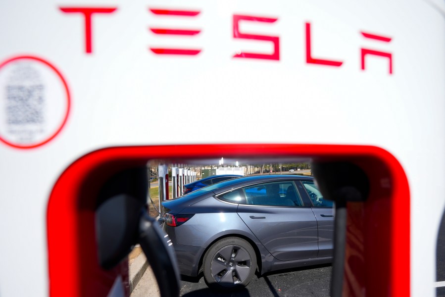 FILE - A Tesla level three Electric vehicle charger is visible, Feb. 2, 2024, in Kennesaw, Ga., near Atlanta. (AP Photo/Mike Stewart, File)