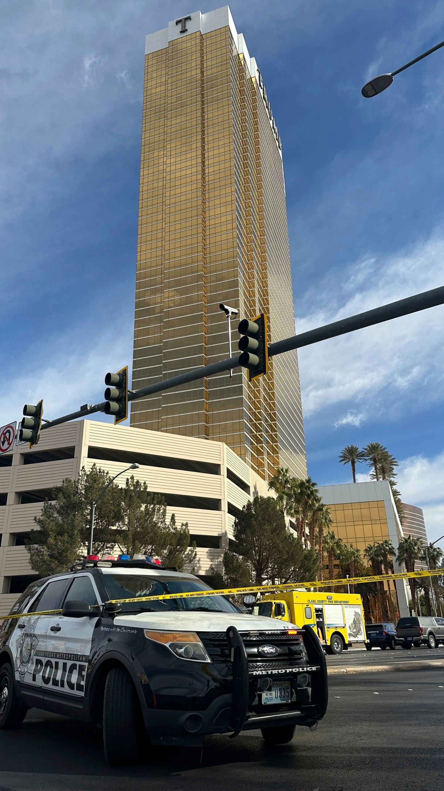 Police block the area after a vehicle caught fire and exploded outside the lobby of President-elect Donald Trump's hotel Wednesday, Jan. 1, 2025. (AP Photo/Ty ONeil)