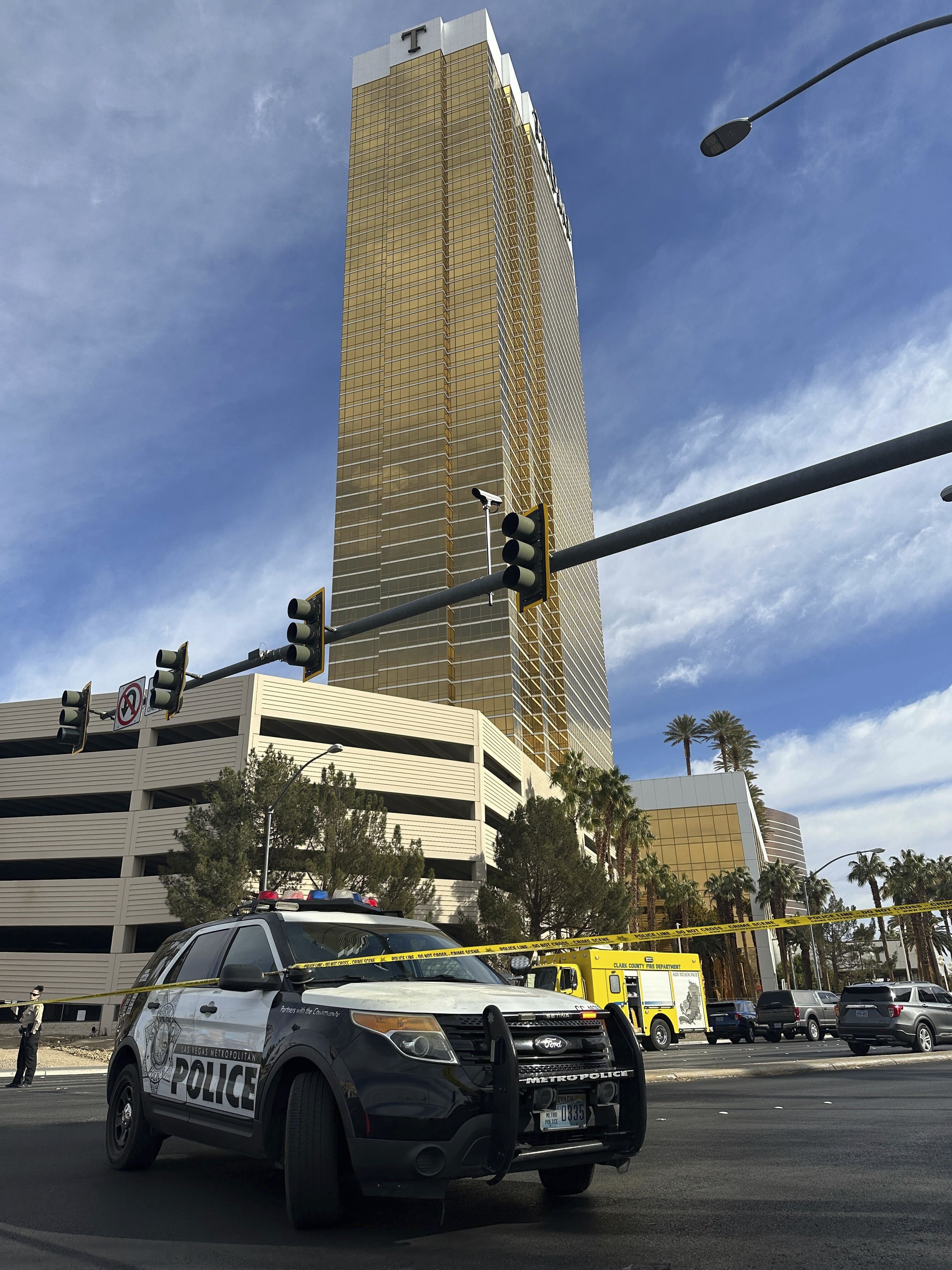 Police block the area after a vehicle caught fire and exploded outside the lobby of President-elect Donald Trump's hotel Wednesday, Jan. 1, 2025. (AP Photo/Ty ONeil)