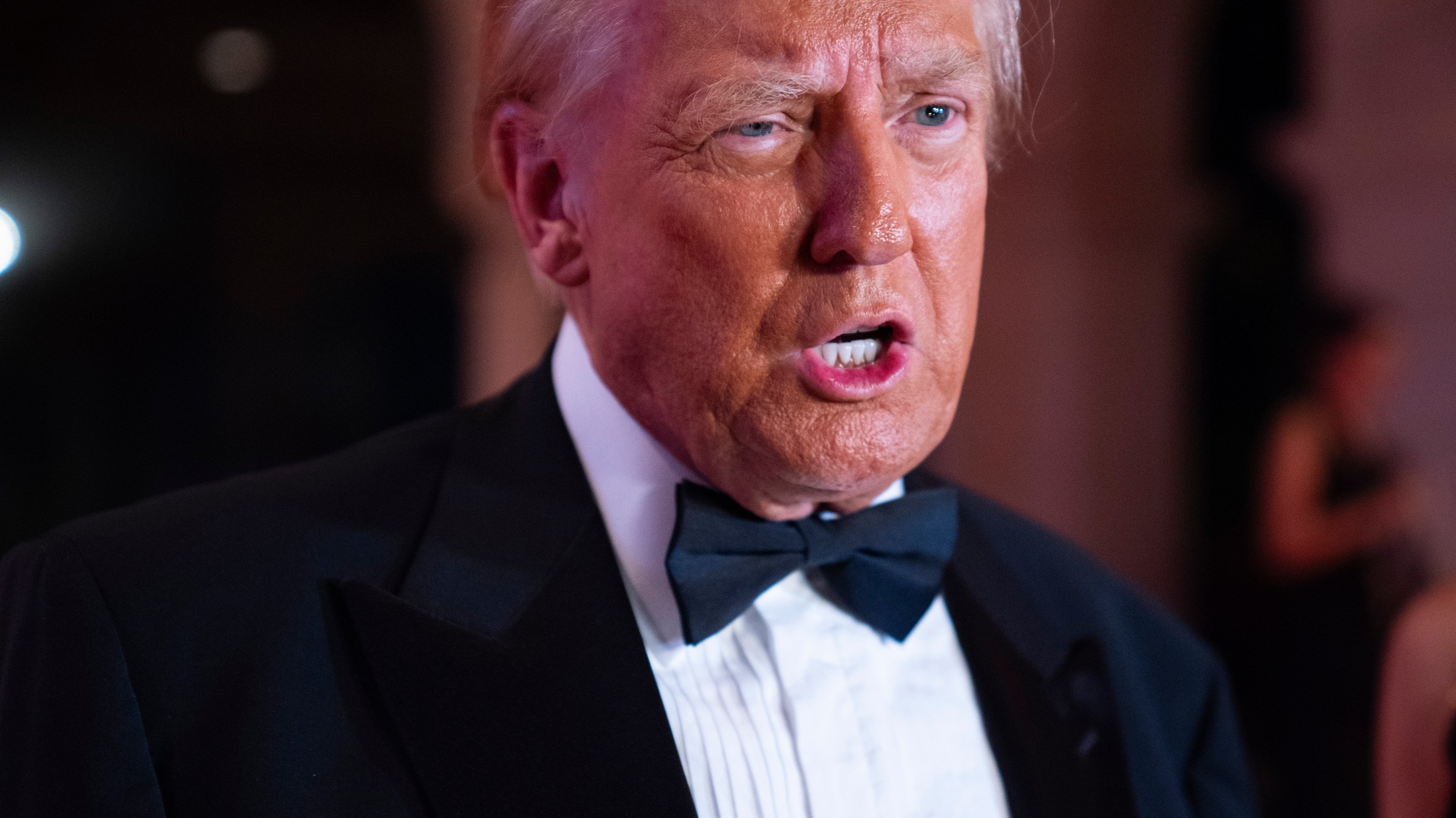 President-elect Donald Trump speaks to reporters before a New Year's Eve party at Mar-a-Lago, Tuesday, Dec. 31, 2024, in Palm Beach, Fla. (AP Photo/Evan Vucci)