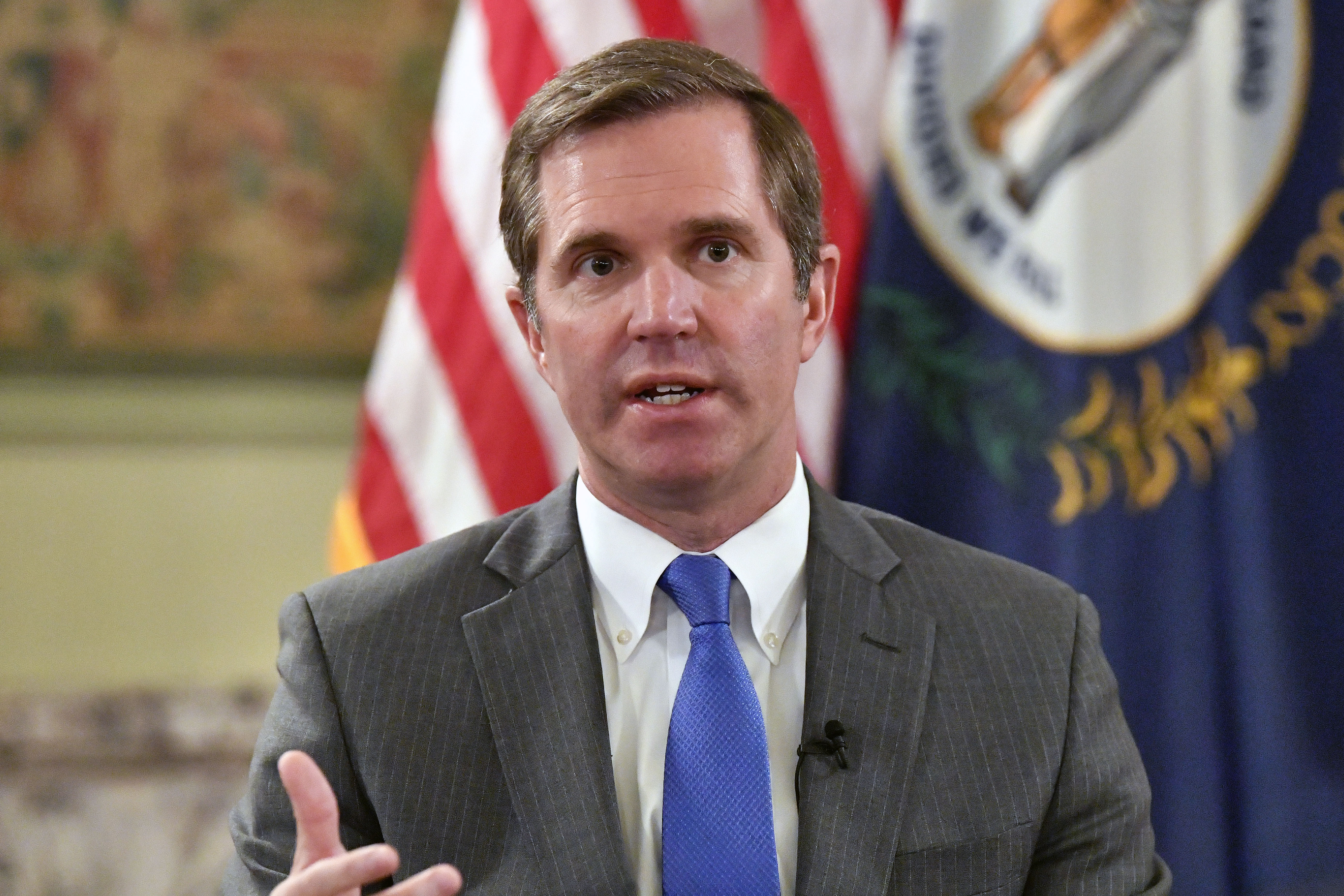 Kentucky Gov. Andy Beshear talks about the gains in the economic growth f the state during the past year in Frankfort, Ky., Wednesday, Dec. 18, 2024. (AP Photo/Timothy D. Easley)