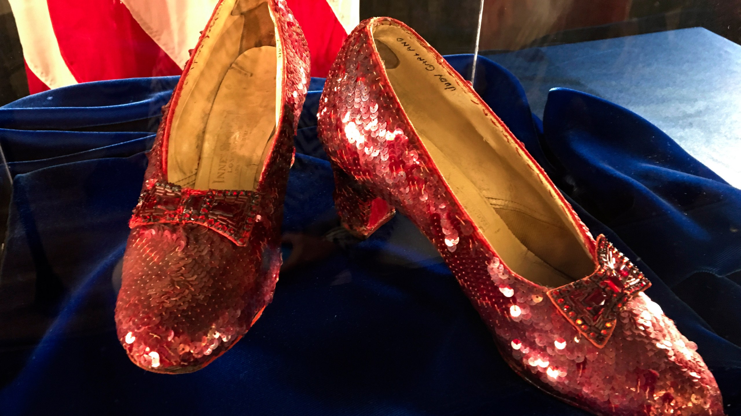 FILE - Ruby slippers once worn by Judy Garland in the "The Wizard of Oz," are displayed at a news conference, Sept. 4, 2018, at the FBI office in Brooklyn Center, Minn. (AP Photo/Jeff Baenen, File)