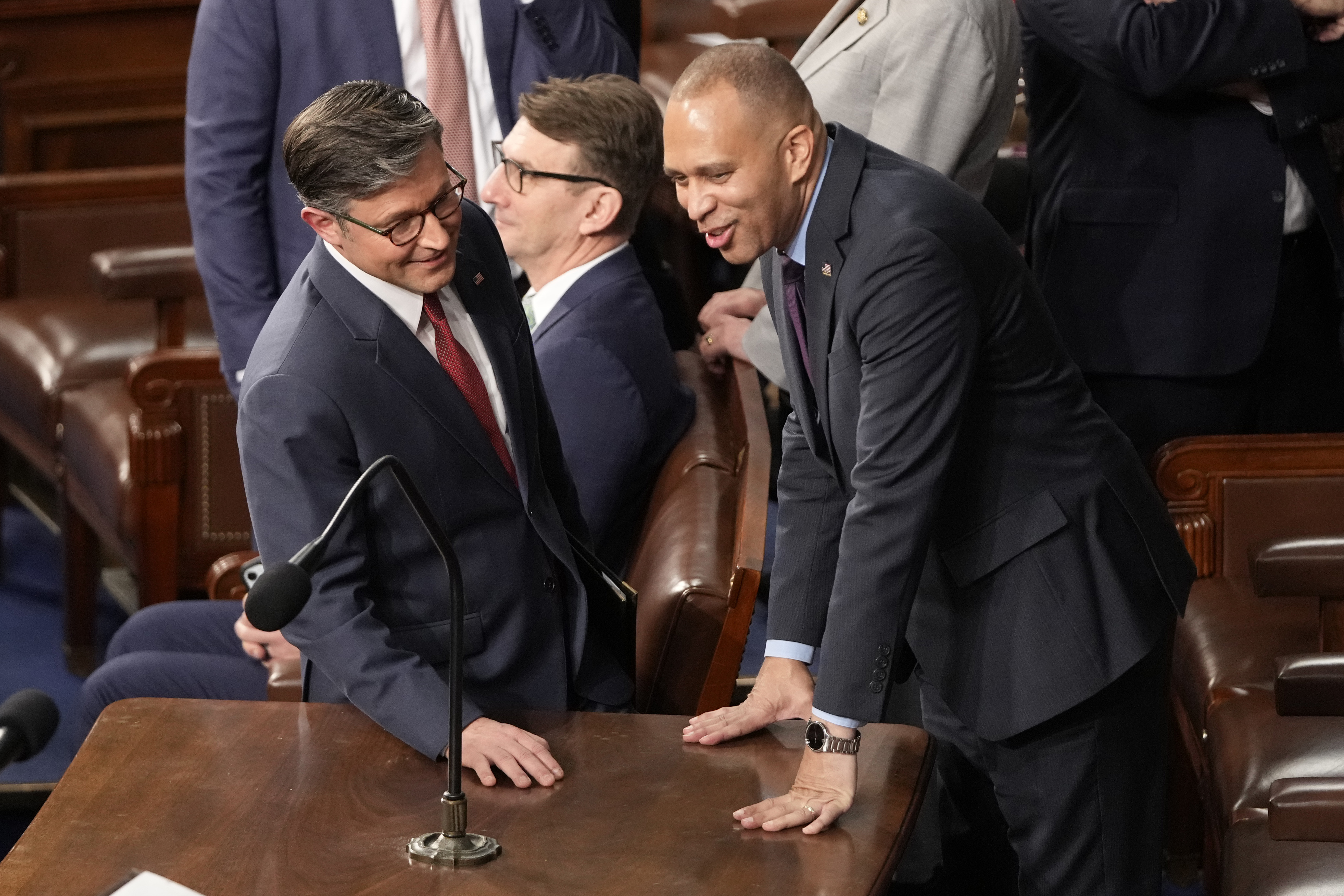 House Speaker Mike Johnson, R-La., left, speaks with House Minority Leader Hakeem as the House of Representatives meets to elect a speaker and convene the new 119th Congress at the Capitol in Washington, Friday, Jan. 3, 2025.(AP Photo/Mark Schiefelbein)