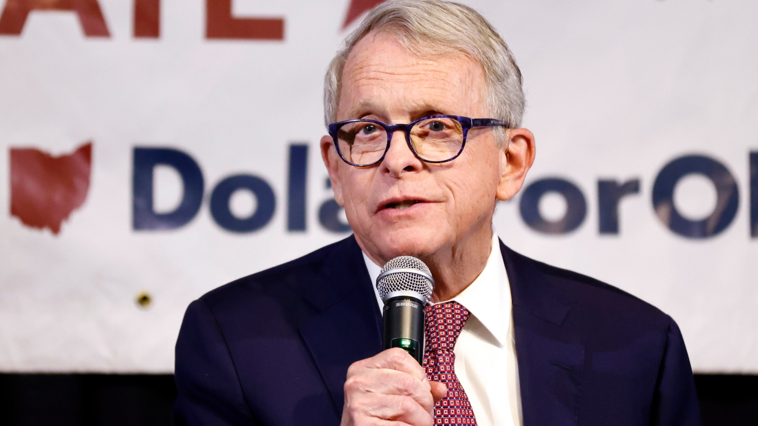 FILE - Ohio Gov. Mike DeWine introduces Ohio state senator and Republican candidate for U.S. Senate Matt Dolan during a campaign event in Columbus, Ohio, Monday, March 18, 2024. (AP Photo/Paul Vernon, File)