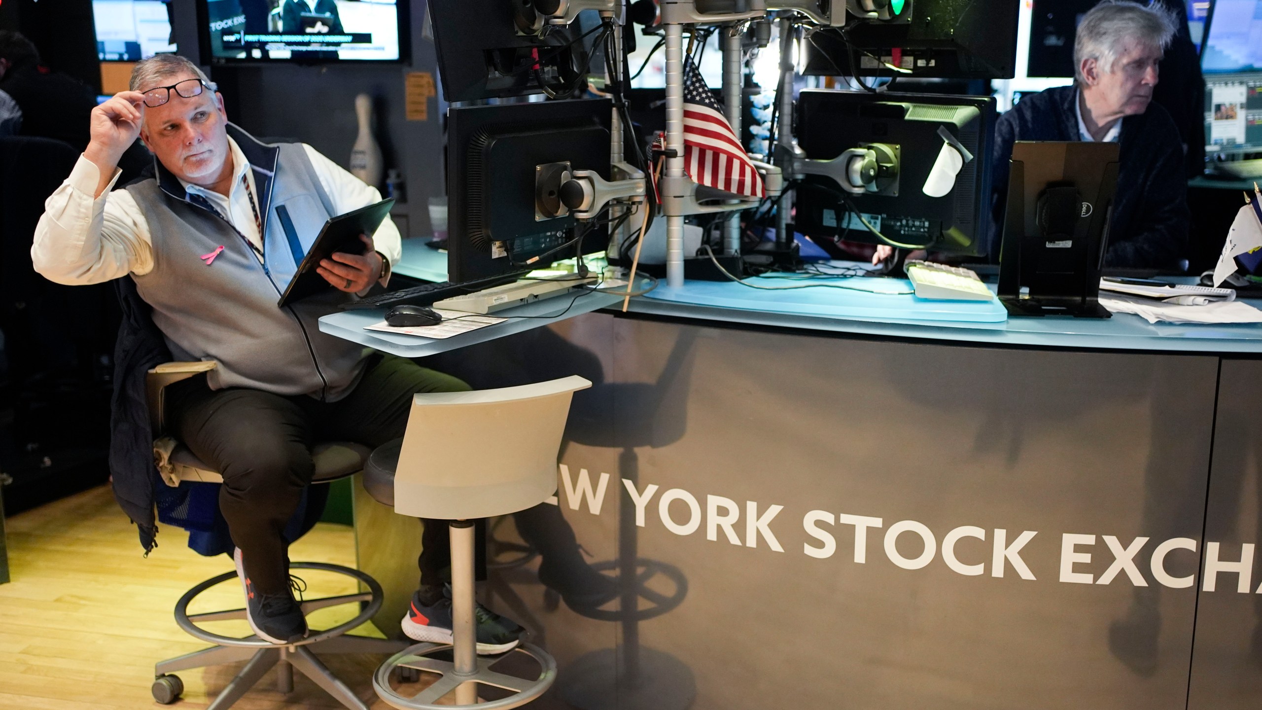 Traders work on the floor at the New York Stock Exchange in New York's Financial District Thursday, Jan. 2, 2025. (AP Photo/Seth Wenig)